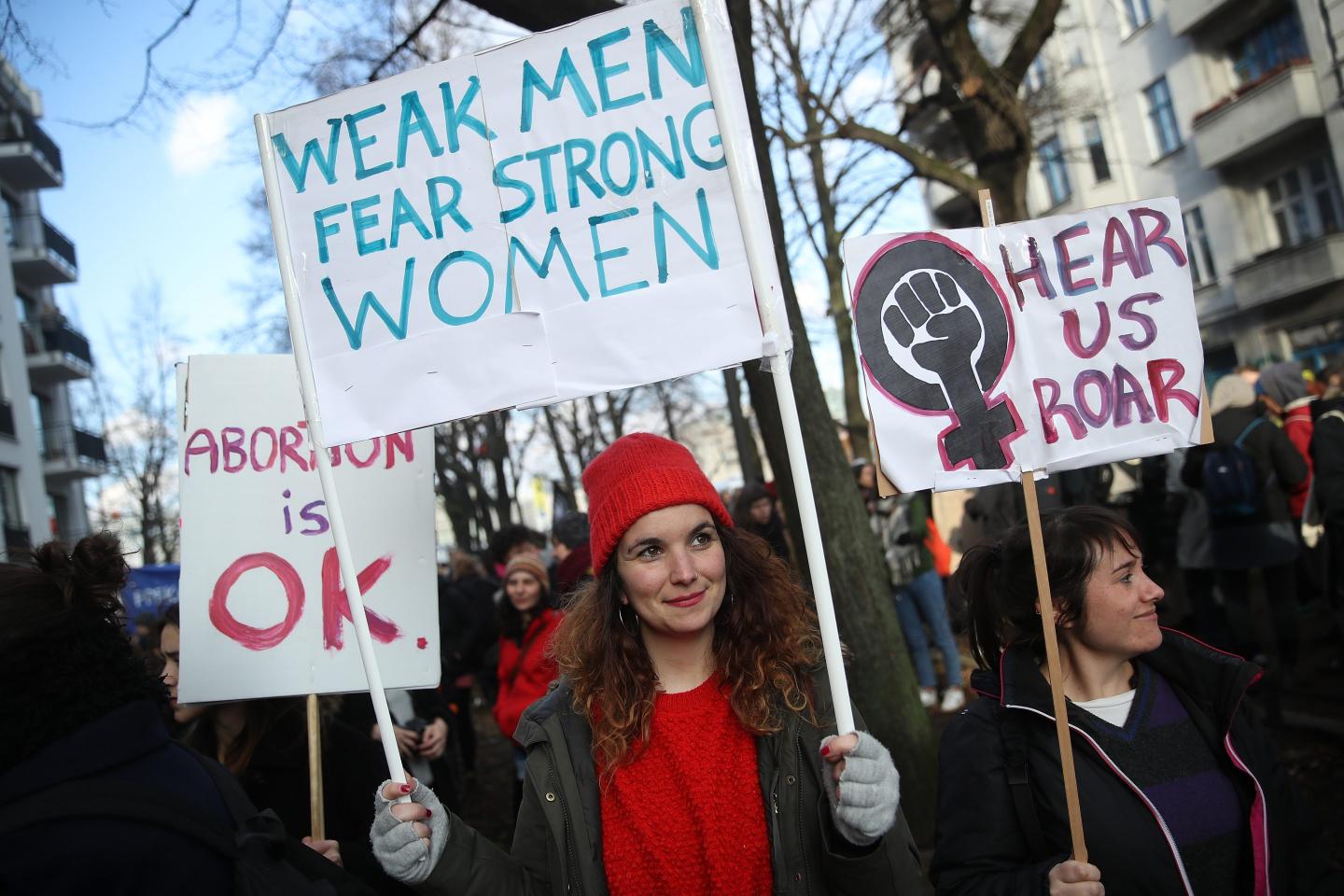 Women attend the beginning of a march for women's rights at Schlesisches Tor on International Women's Day on March 8, 2018 in Berlin, Germany.