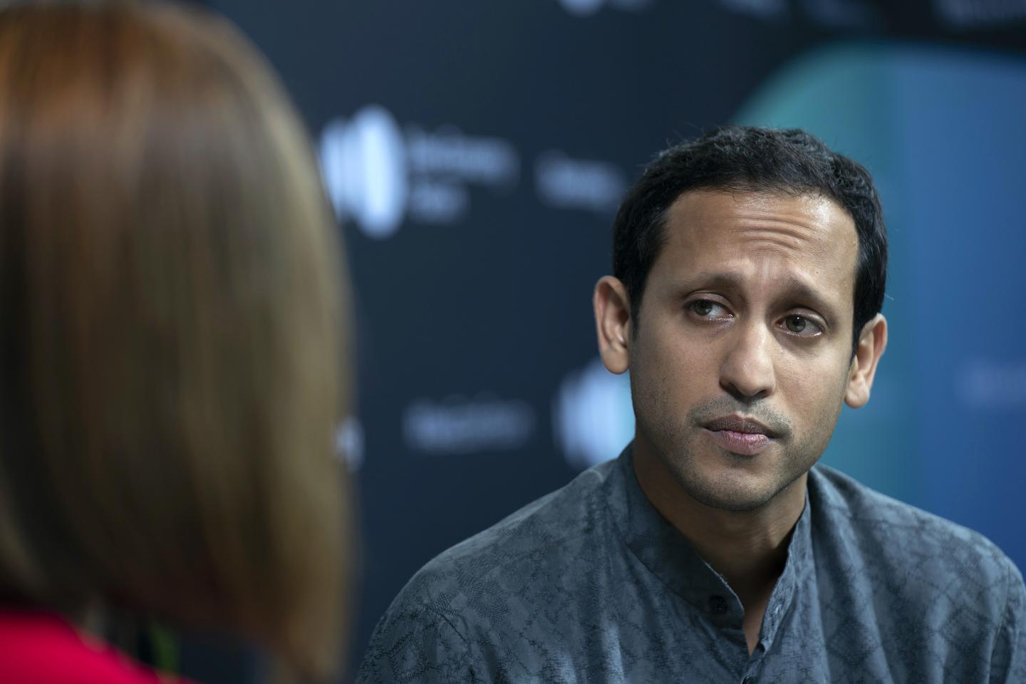 Nadiem Makarim, chief executive officer of Go-Jek, listens during a Bloomberg Television interview on the sidelines of the Bloomberg New Economy Forum in Singapore, on Tuesday, Nov. 6, 2018. The New Economy Forum, organized by Bloomberg Media Group, a division of Bloomberg LP, aims to bring together leaders from public and private sectors to find solutions to the world's greatest challenges. Photographer: Wei Leng Tay/Bloomberg via Getty Images