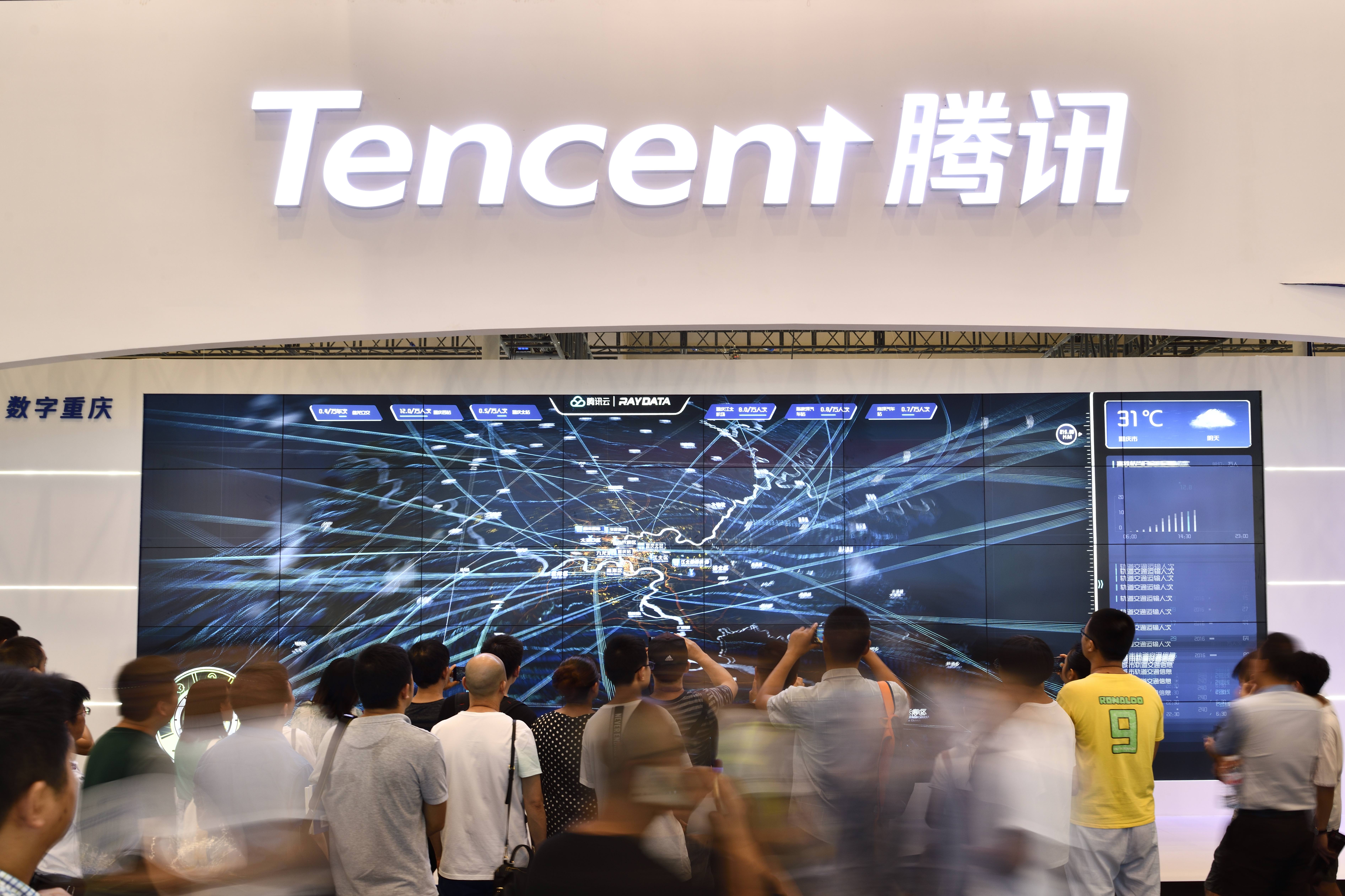 CHONGQING, CHINA - AUGUST 27: Citizens visit Tencent booth on day two of 2019 Smart China Expo at Chongqing International Expo Center on August 27, 2019 in Chongqing, China. 2019 Smart China Expo is held from August 26 to 29 in Chongqing. (Photo by VCG/VCG via Getty Images)