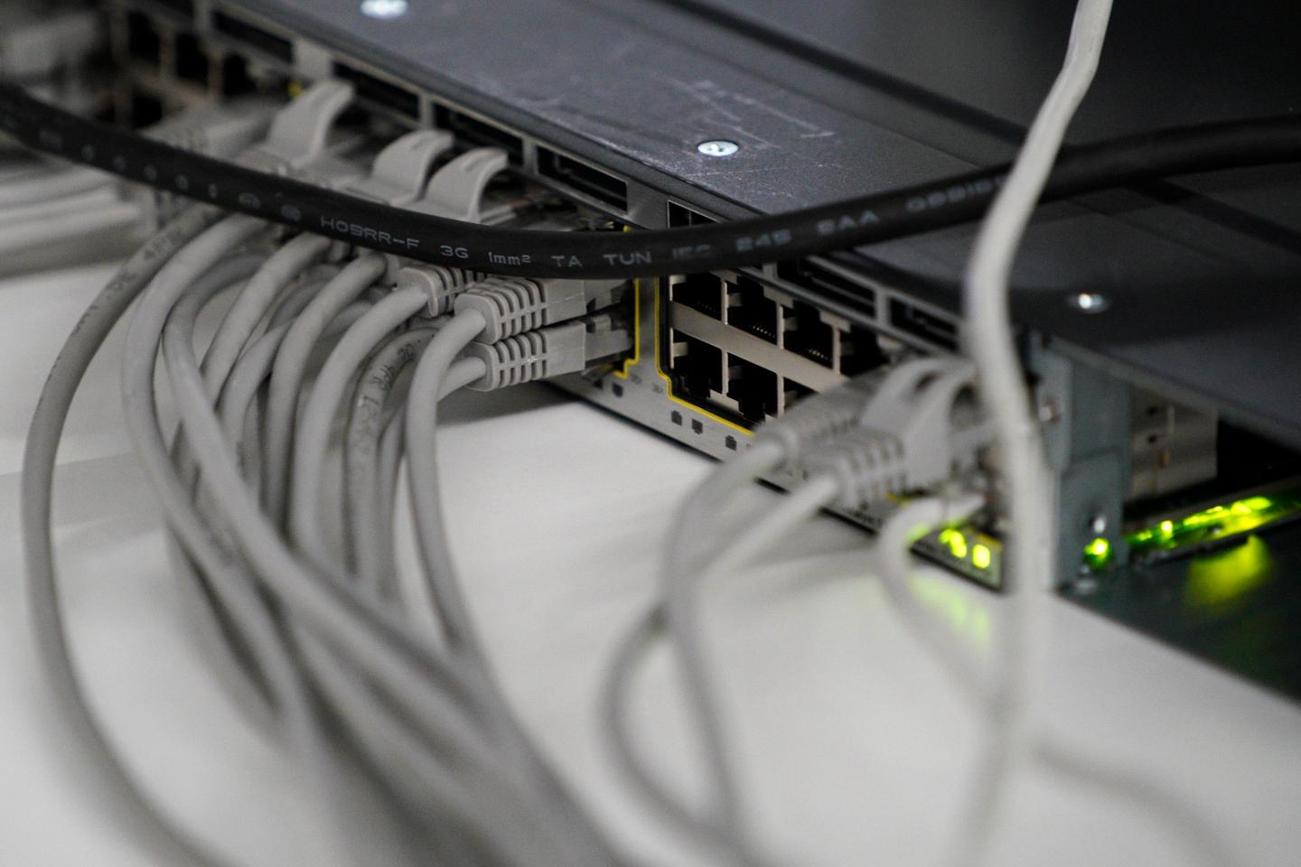 Routers with network cables are seen during the Hackyeah hackathon in Warsaw, Poland on September 18, 2019. The Hackyeah hackathon is the largest stationary hackathon in Europe with around 2500 participants taking part in an overnight hacking compeition and over 100 thousand Euros in prize money. (Photo by Jaap Arriens/NurPhoto via Getty Images)