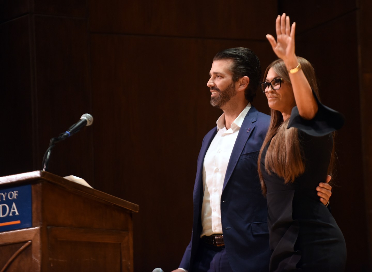 Donald Trump, Jr hugs his girlfriend, Kimberly Guilfoyle,