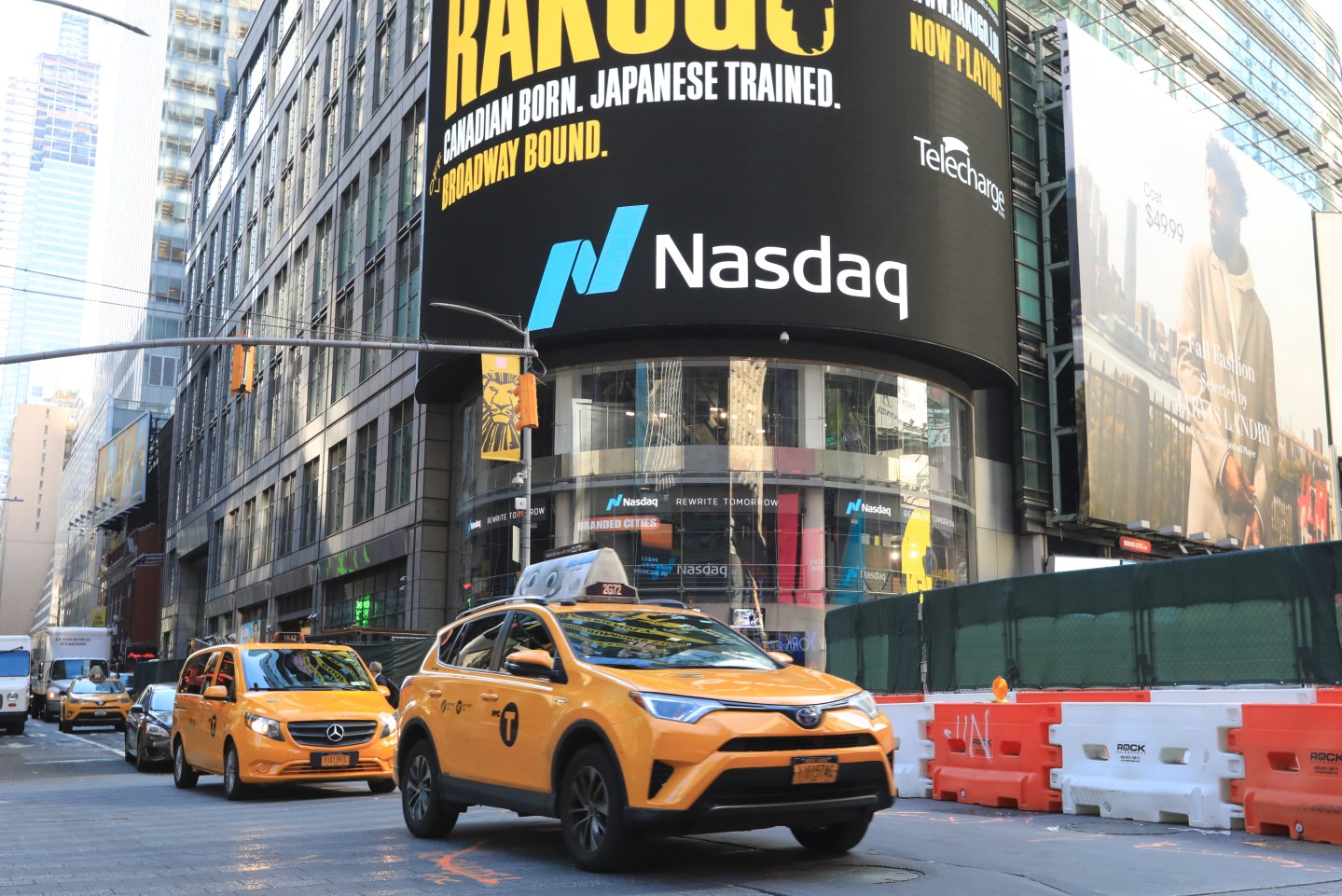 NASDAQ tops 9,000 for the first time.