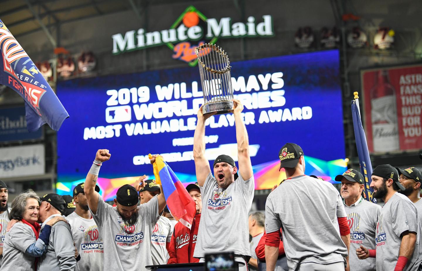 HOUSTON, TEXAS - OCTOBER 30: The Washington Nationals, including Washington Nationals first baseman Ryan Zimmerman (11) holding trophy, celebrate beating the Houston Astros 6-2 in Game 7 of the World Series at Minute Maid Park on Wednesday, October 30, 2019.(Photo by Jonathan Newton/The Washington Post via Getty Images)