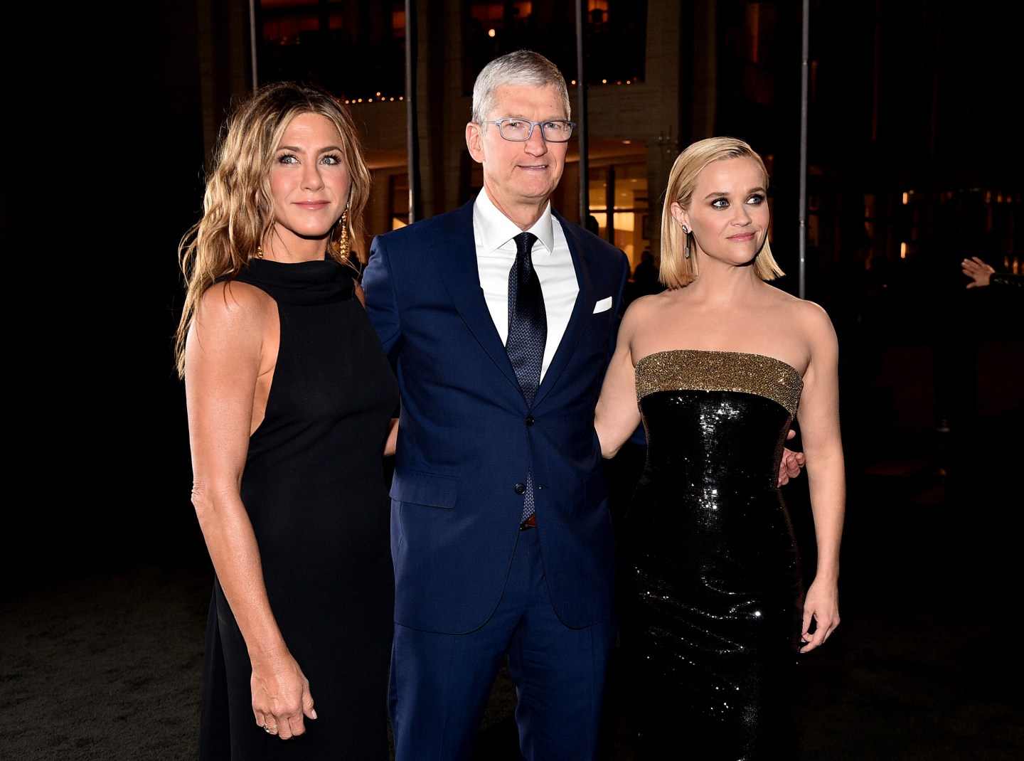 Jennifer Aniston (left), Apple CEO Tim Cook (center) and Reese Witherspoon attend the Apple TV+'s "The Morning Show" world premiere