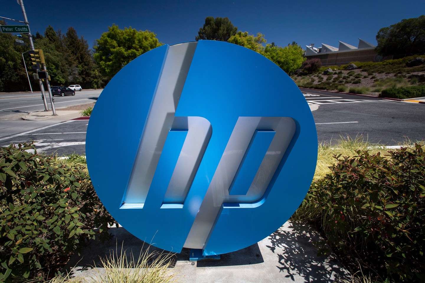 HP Inc. signage stands on display outside the company's headquarters in Palo Alto, California, U.S., on Monday, May 28, 2018.