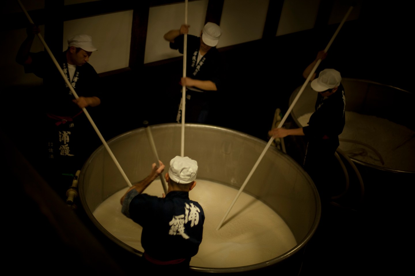 Sake production at Urakasumi Brewery.