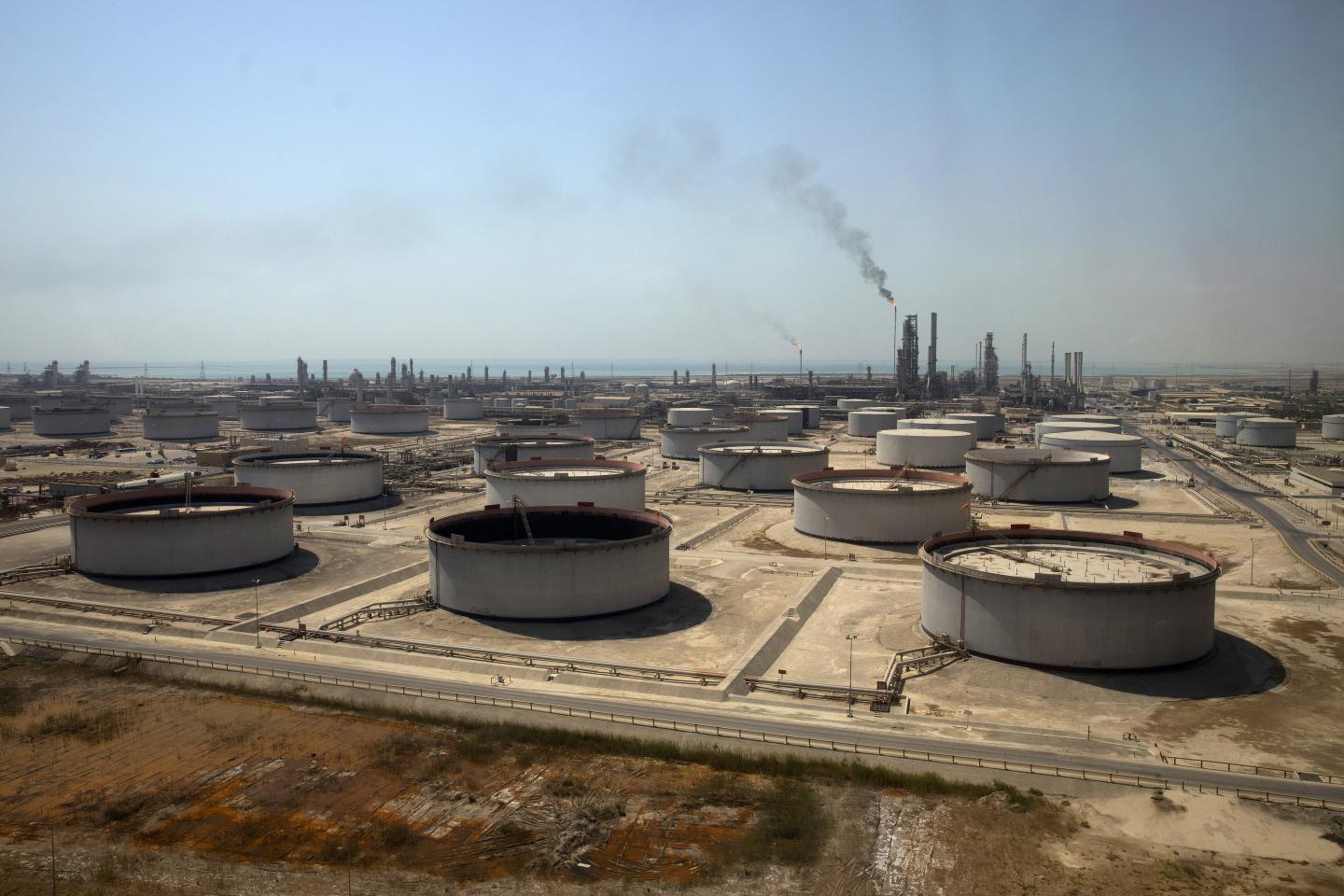 Crude oil storage tanks at the Juaymah Tank Farm in Saudi Aramco's Ras Tanura oil refinery and oil terminal in Ras Tanura, Saudi Arabia, on Monday, Oct. 1, 2018.
