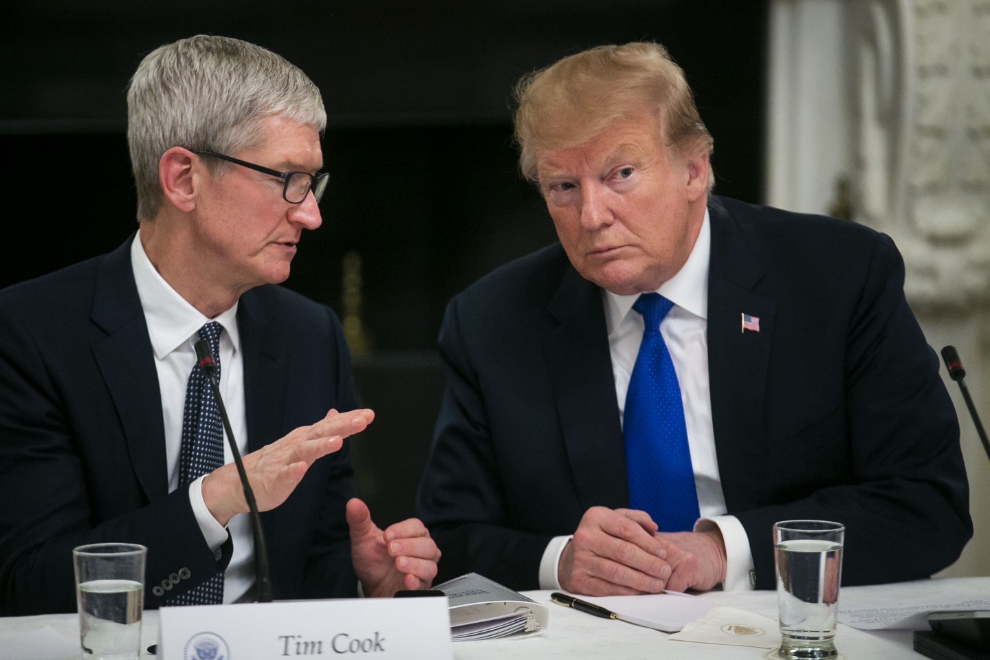 Tim Cook, chief executive officer of Apple Inc., left, speaks with U.S. President Donald Trump during an American Workforce Policy Advisory board meeting in the State Dining Room of the White House in Washington, D.C., U.S., on Wednesday, March 6, 2019. Senator Chuck Grassley of Iowa, one of the few Republicans with the power to request President Trump's tax returns wants to make sure that if House Democrats are successful in getting them, he wants to see them, too. Photographer: Al Drago/Bloomberg via Getty Images