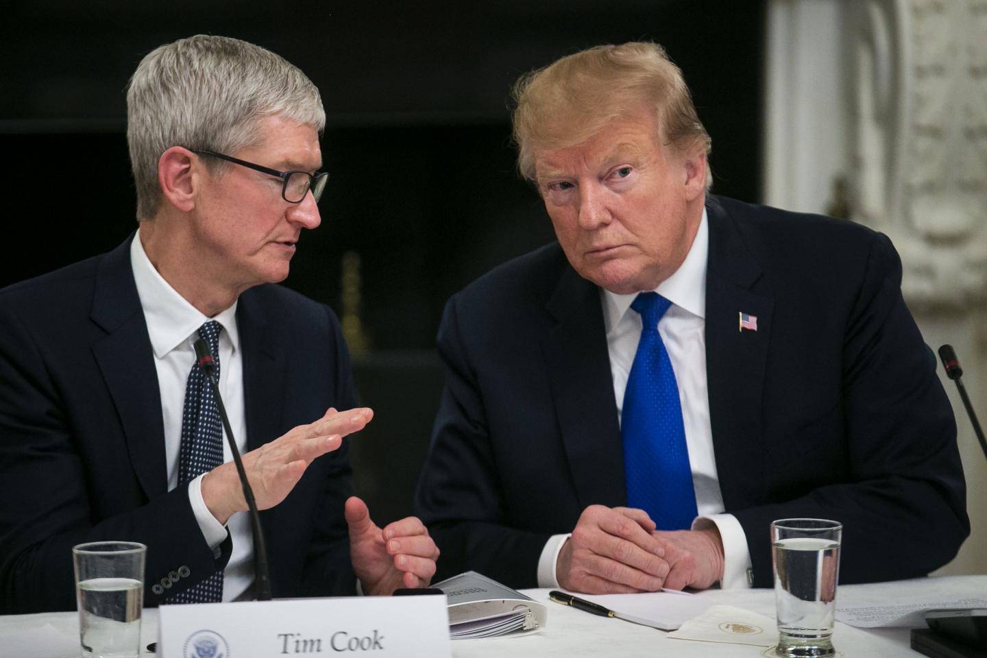 Tim Cook, chief executive officer of Apple Inc., left, speaks with U.S. President Donald Trump during an American Workforce Policy Advisory board meeting in the State Dining Room of the White House in Washington, D.C., U.S., on Wednesday, March 6, 2019. Senator Chuck Grassley of Iowa, one of the few Republicans with the power to request President Trump's tax returns wants to make sure that if House Democrats are successful in getting them, he wants to see them, too. Photographer: Al Drago/Bloomberg via Getty Images