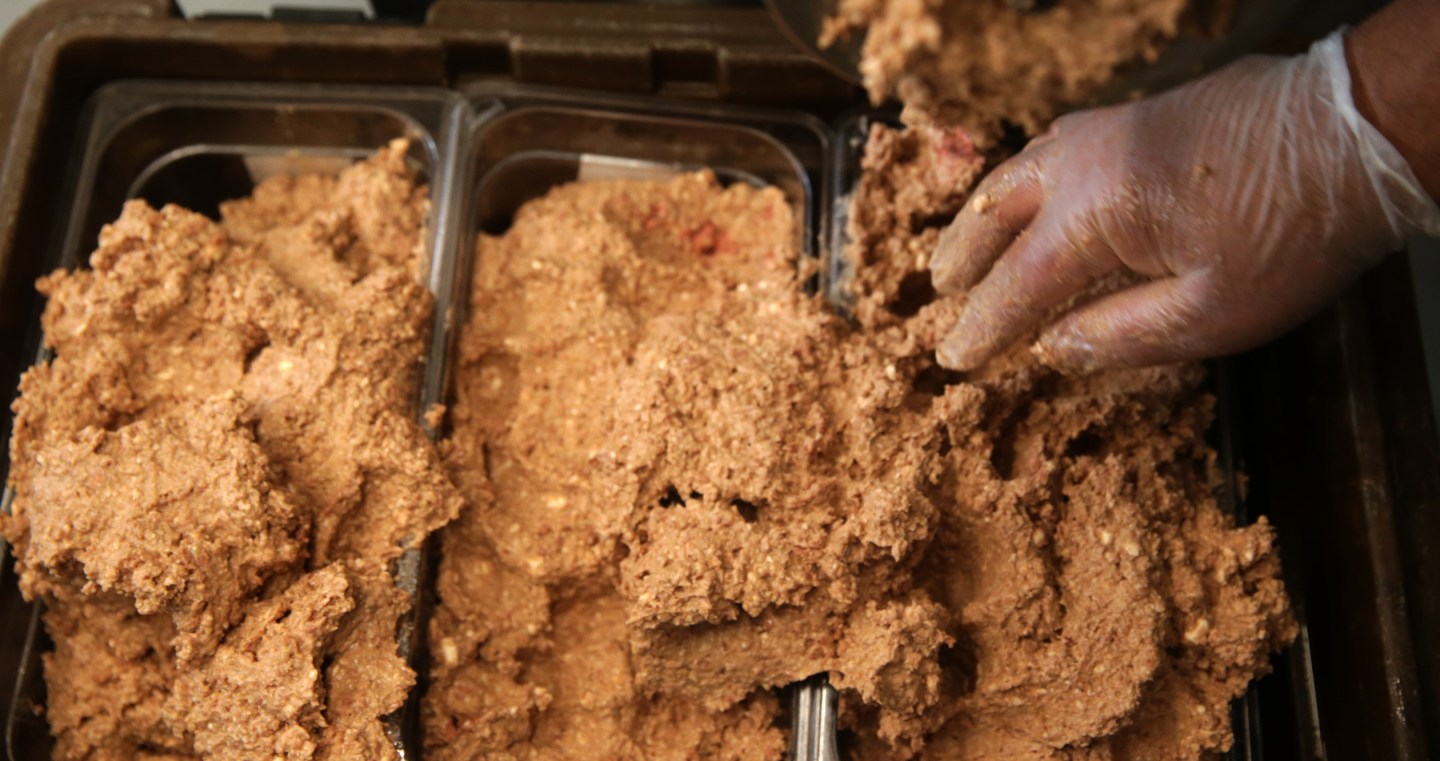 CAMBRIDGE, MA - JUNE 25: Soy-based vegan Impossible Foods beef is mixed with other ingredients before being prepared as meatballs at Clover Food Labs in Cambridge, MA on June 25, 2019. As the popularity of plant-based foods grows, keeping up with demand for one especially popular meat substitute is proving to be difficult - almost impossible. Some local restaurants that advertise the Impossible Burger havent been able to serve the product to customers lately because of a nationwide shortage of the beef alternative. Launched out of Redwood City, Calif., in 2011, Impossible Foods makes meat burgers from genetically engineered soy heme protein, which gives the patty a taste and texture that resembles beef. A spokeswoman for Impossible Foods said the burgers popularity has soared since the company introduced a new recipe in January, with revenue growing 50 percent so far this year. (Photo by Jonathan Wiggs/The Boston Globe via Getty Images)