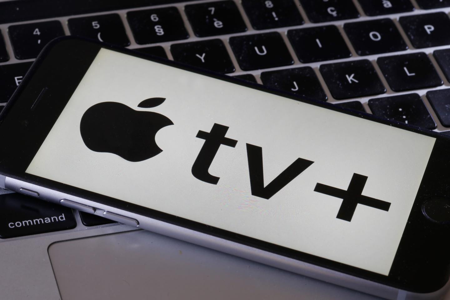 PARIS, FRANCE - SEPTEMBER 11: In this photo illustration, the Apple TV Plus logo is displayed on an iPhone screen on September 11, 2019 in Paris, France. Yesterday, the US multinational Apple announced at its keynote launch its video on demand web television entitled Apple TV Plus. video streaming service Apple TV + will be available from November 1, 2019 in France and in a hundred countries at a rate of 4.99 euros per month.