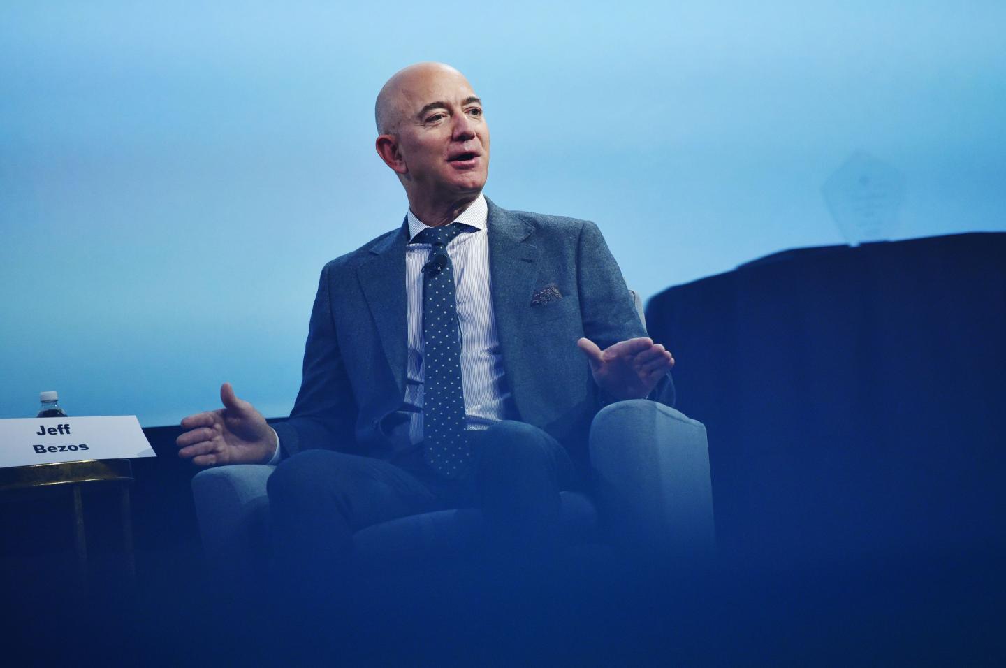 Blue Origin and Amazon founder Jeff Bezos speaks after receiving the 2019 International Astronautical Federation (IAF) Excellence in Industry Award during the the 70th International Astronautical Congress at the Walter E. Washington Convention Center in Washington, DC on October 22, 2019. (Photo by MANDEL NGAN / AFP) (Photo by MANDEL NGAN/AFP via Getty Images)