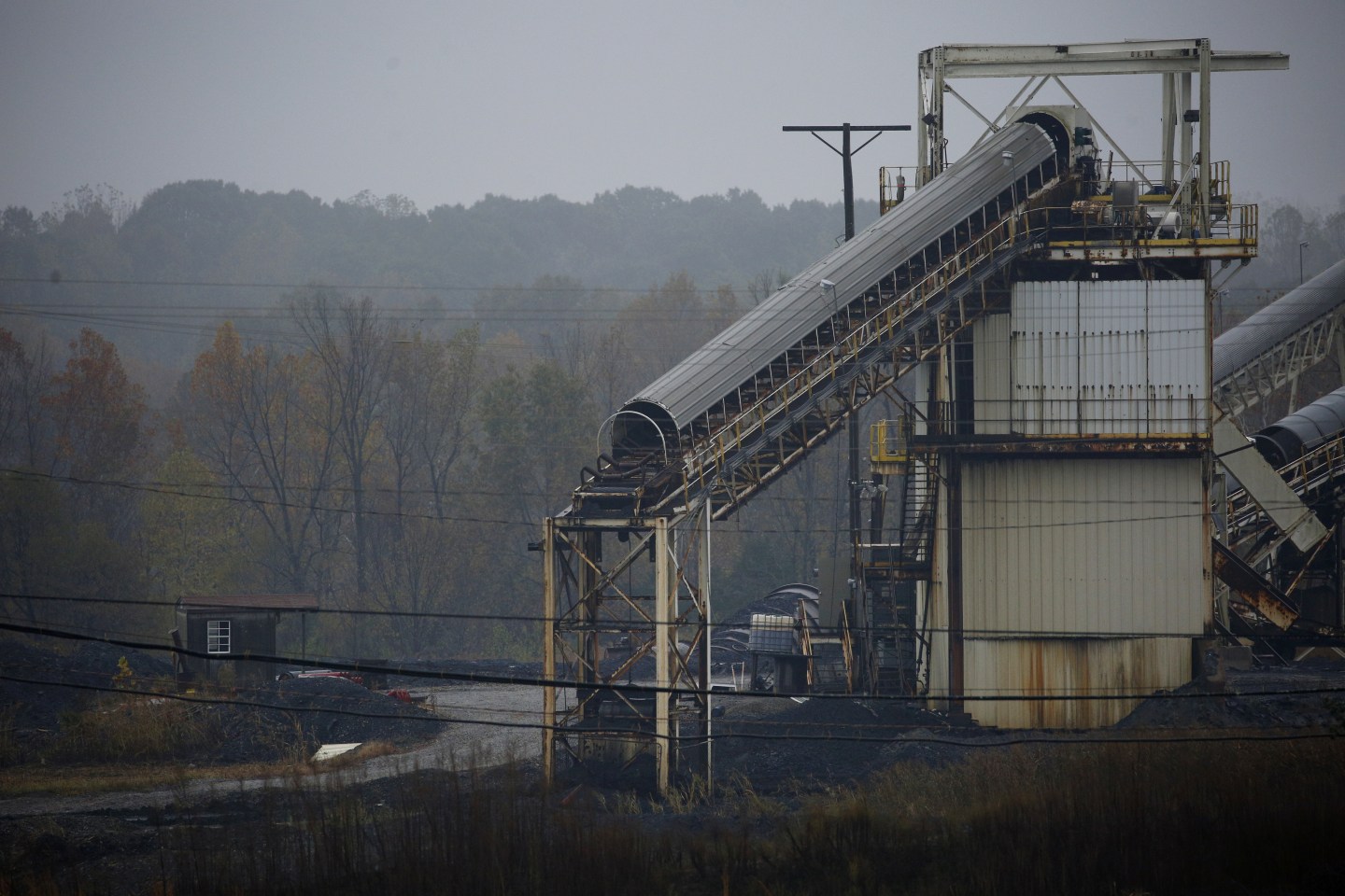 A coal conveyor is seen on the grounds of the recently idled Muhlenberg County Coal Co. Paradise Mine, a subsidiary of Murray Energy Holdings Co., in Central City, Kentucky, U.S., on Wednesday, Oct. 30, 2019. Murray Energy, the largest privately owned U.S. coal company, filed for Chapter 11 protection in the U.S. Bankruptcy Court in Columbus, Ohio, to restructure more than $2.7 billion of debt. Photographer: Luke Sharrett/Bloomberg via Getty Images
