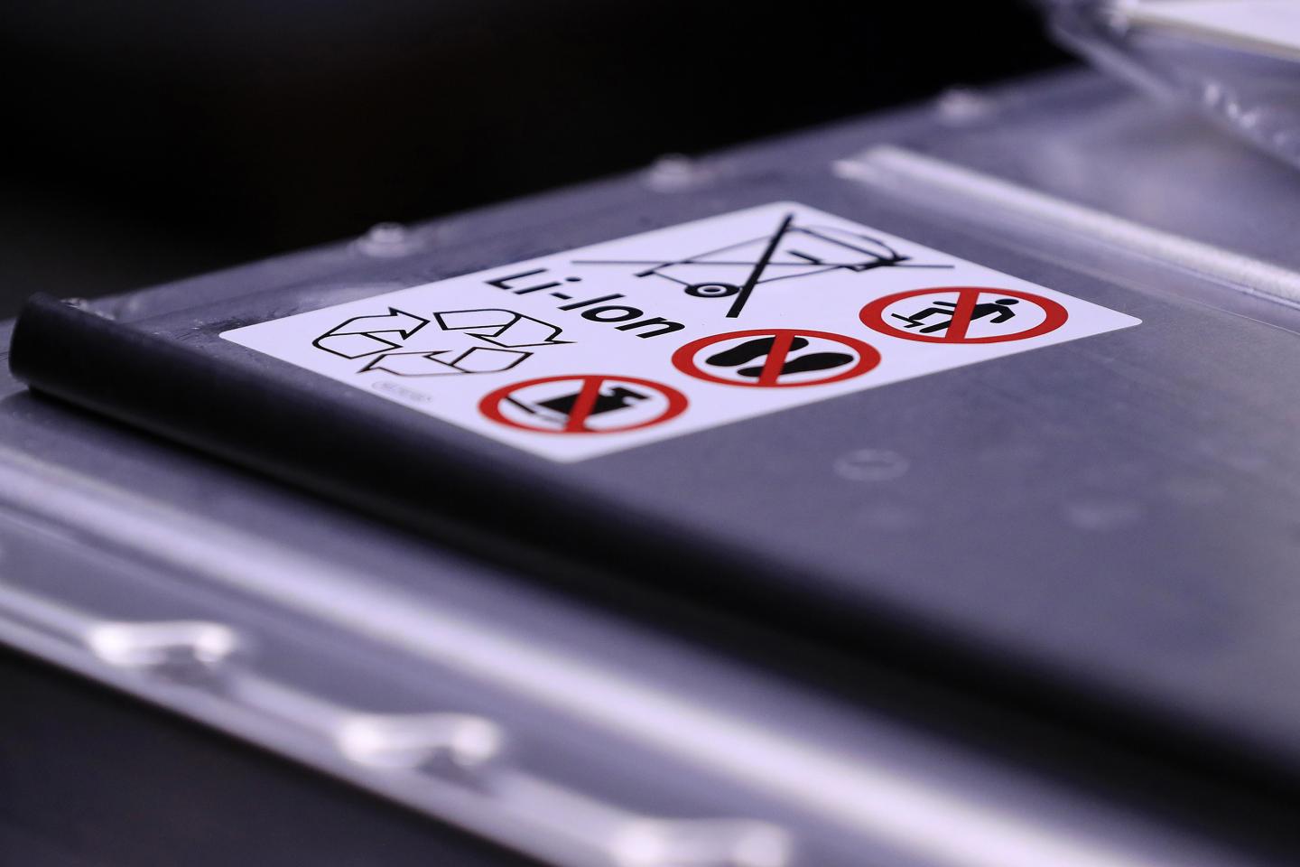 Disposal and recycling information on a lithium-ion automotive battery pack on the Volkswagen AG (VW) ID.3 electric automobile assembly line at the automaker's factory in Zwickau, Germany, on Monday, Nov. 4, 2019.