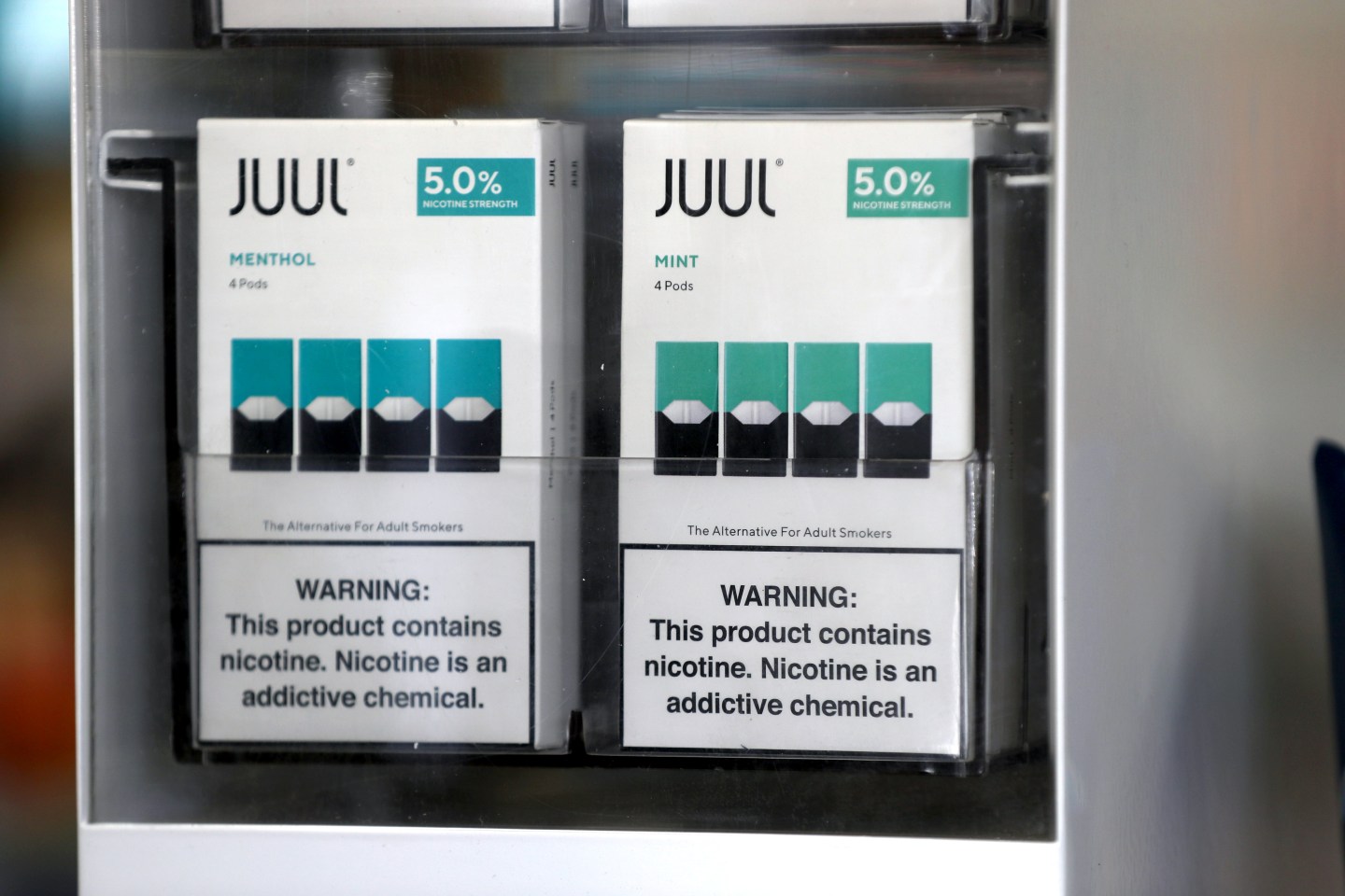 Packages of Juul mint flavored e-cigarettes are displayed at San Rafael Smokeshop on November 07, 2019 in San Rafael, California.