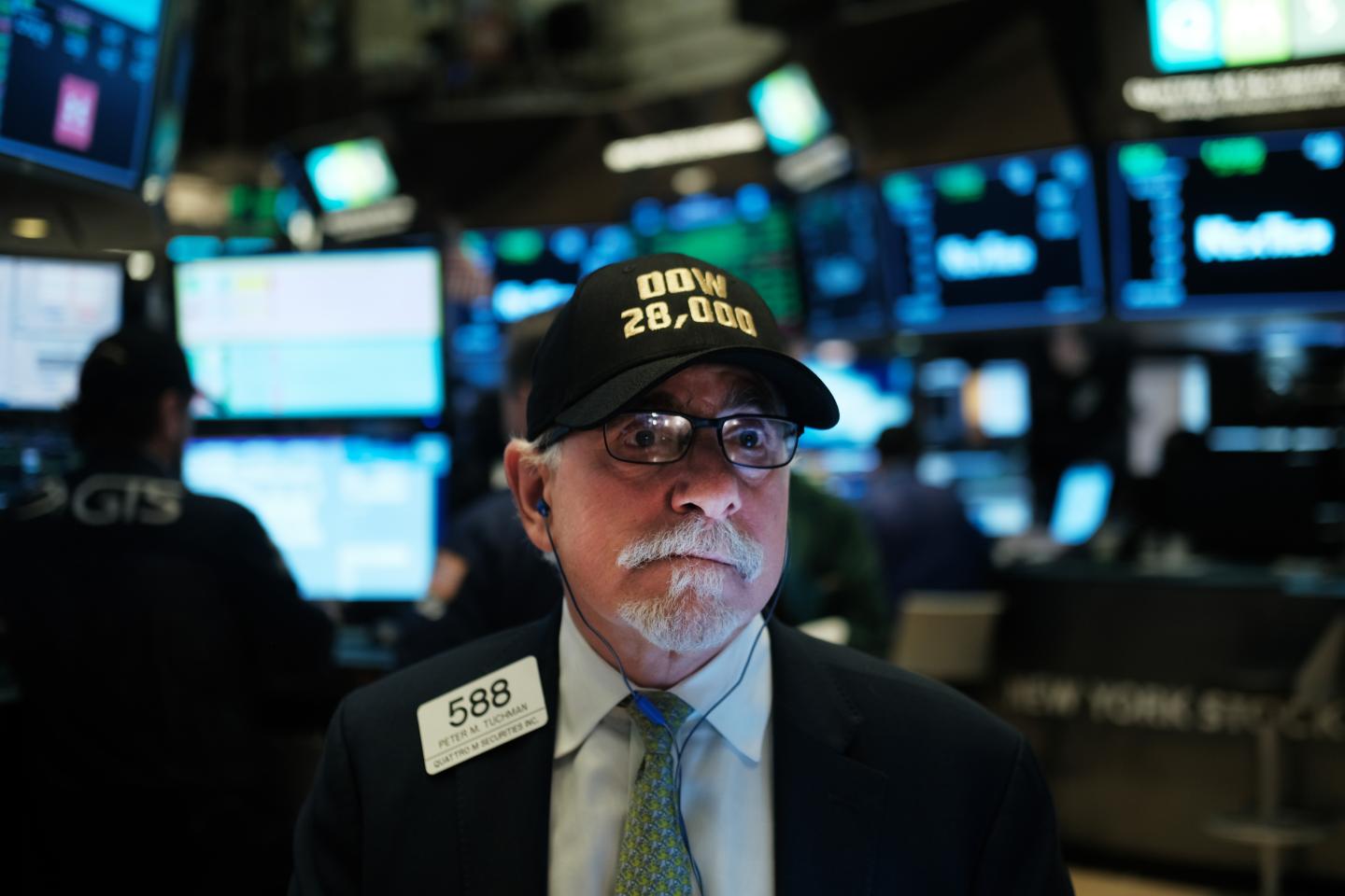 Traders work on the floor of the New York Stock Exchange.