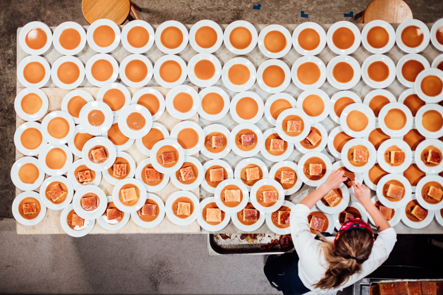 A chef prepares more than 95 plates at Refettorio Gastromotiva in Rio de Janeiro, Brazil.