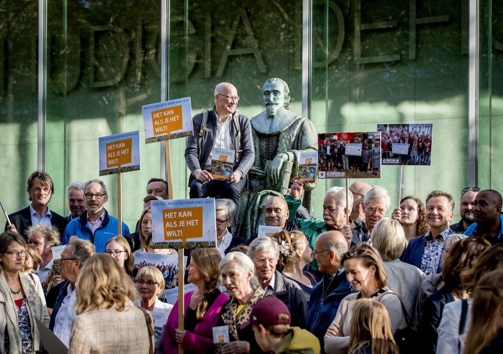 Supporters of Urgenda, gather prior to an earlier appeal in the organization's climate case. On Dec 20, the Dutch Supreme Court ruled in favor of the group