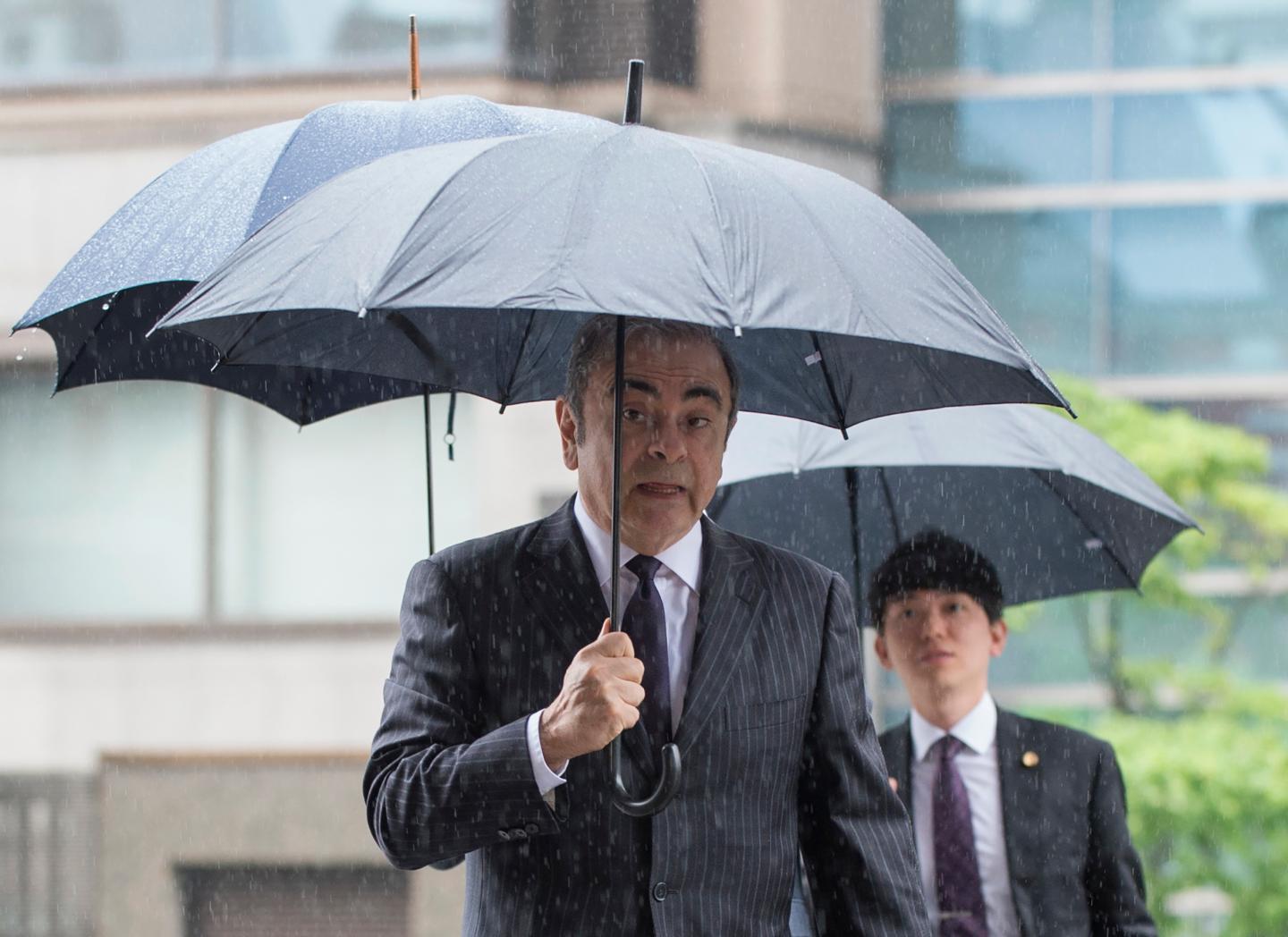 TOPSHOT - Former Nissan Motor Chairman Carlos Ghosn arrives for a pre-trial hearing at the Tokyo District Court in Tokyo on June 24, 2019. - The former Nissan chief was bailed for a second time on April 25 and is now preparing for trial on four charges of financial misconduct ranging from concealing part of his salary, to using Nissan funds for personal expenses. (Photo by Kazuhiro NOGI / AFP) (Photo credit should read KAZUHIRO NOGI/AFP via Getty Images)
