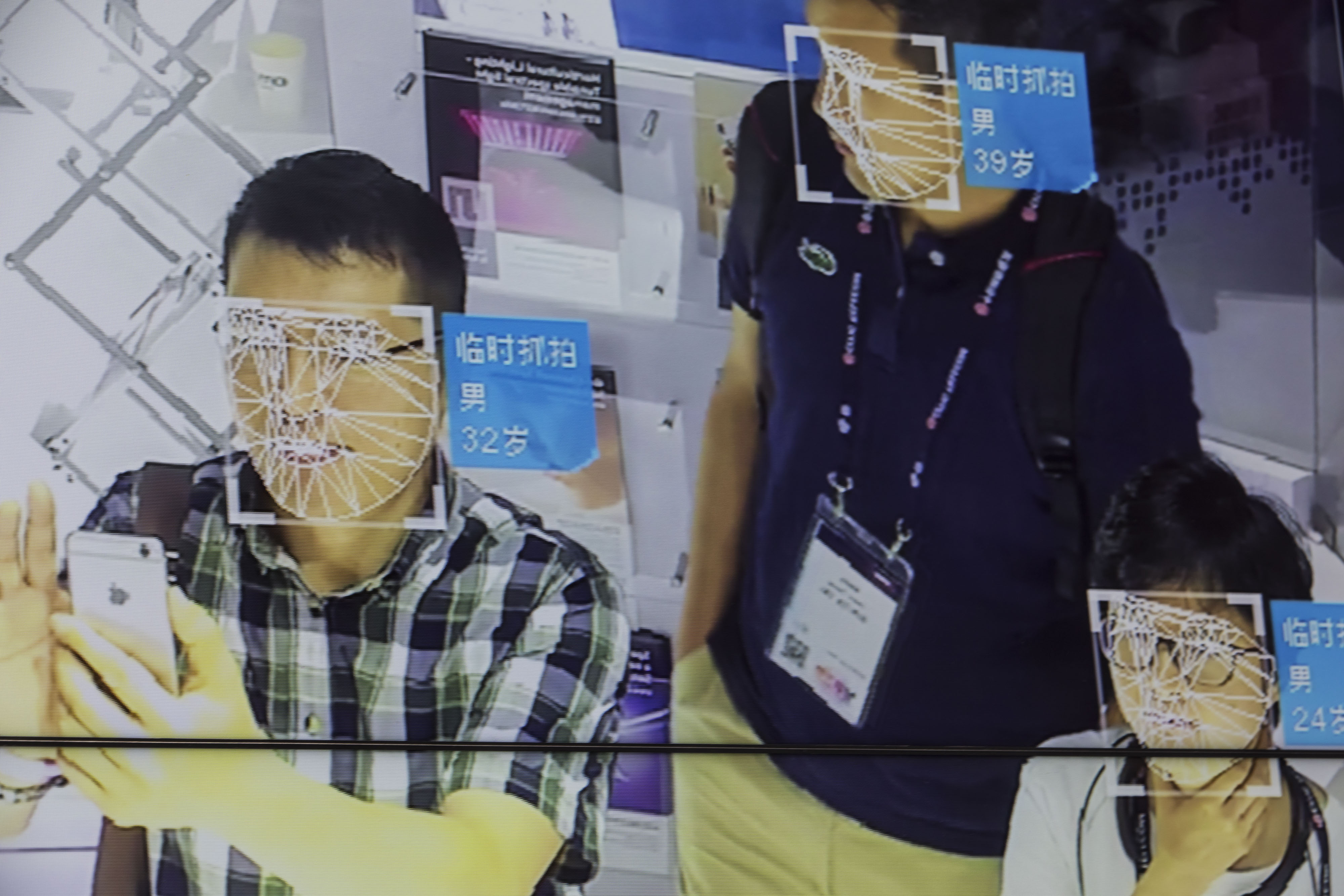 A screen demonstrates facial-recognition technology at the Beijing Megvii Co. booth at the MWC Shanghai exhibition in Shanghai, China, on Thursday, June 27, 2019. The Shanghai event is modeled after a bigger annual industry show in Barcelona. Photographer: Qilai Shen/Bloomberg via Getty Images