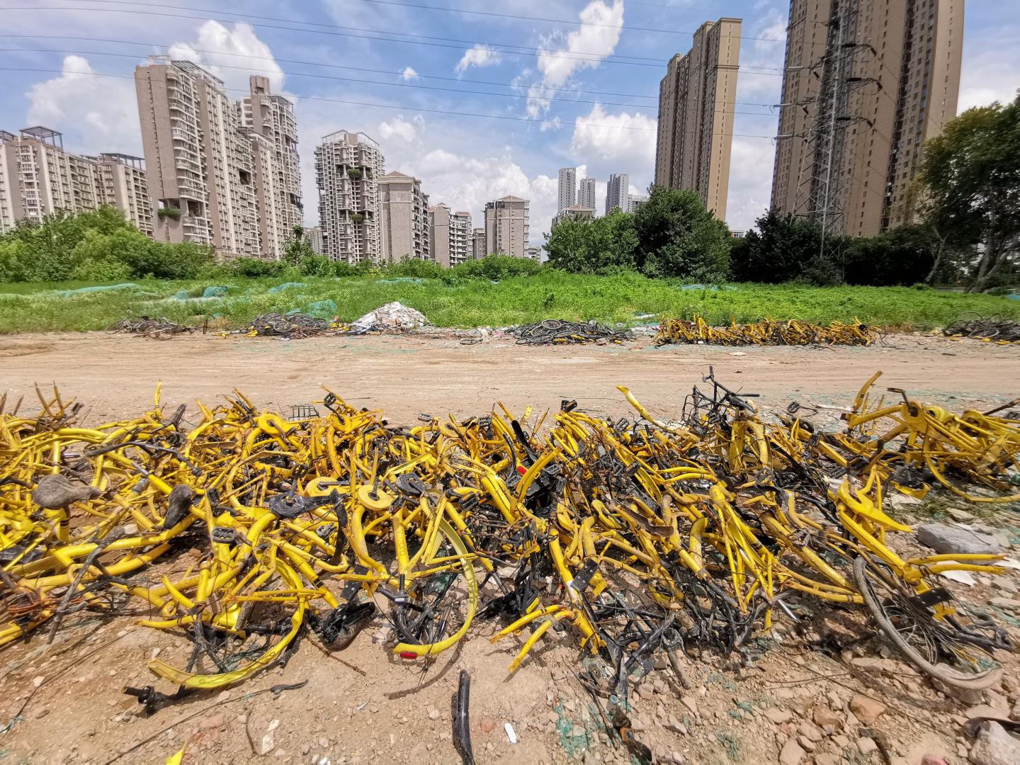 WUHAN, CHINA - AUGUST 10: Parts of Ofo sharing bicycles are seen piled up at an open area after being dismantled on August 10, 2019 in Wuhan, Hubei Province of China. (Photo by Visual China Group via Getty Images/Visual China Group via Getty Images)
