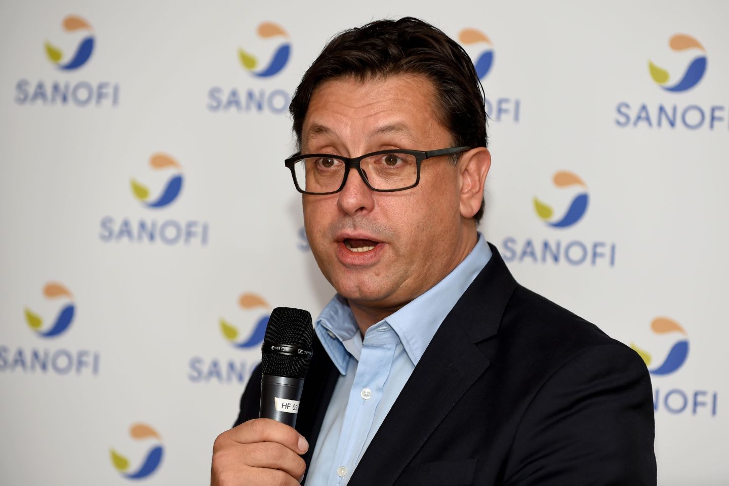 New British Chief Executive Officer of French pharmaceutical group Sanofi Paul Hudson talks to journalists at Sanofi headquarters in Paris on October 1, 2019. (Photo by ERIC PIERMONT / AFP) (Photo by ERIC PIERMONT/AFP via Getty Images)