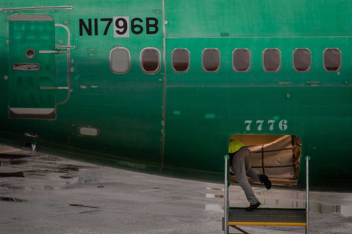 RENTON, WA - OCTOBER 20: A worker inspects a Boeing 737 MAX aircraft at Boeing's Renton Factory on October 20, 2019 in Renton, Washington. (Photo by Gary He/Getty Images)