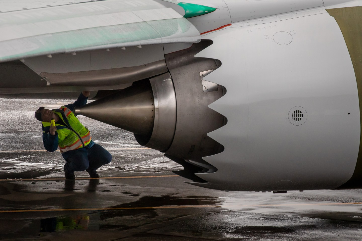A worker inspects a Boeing 737 MAX