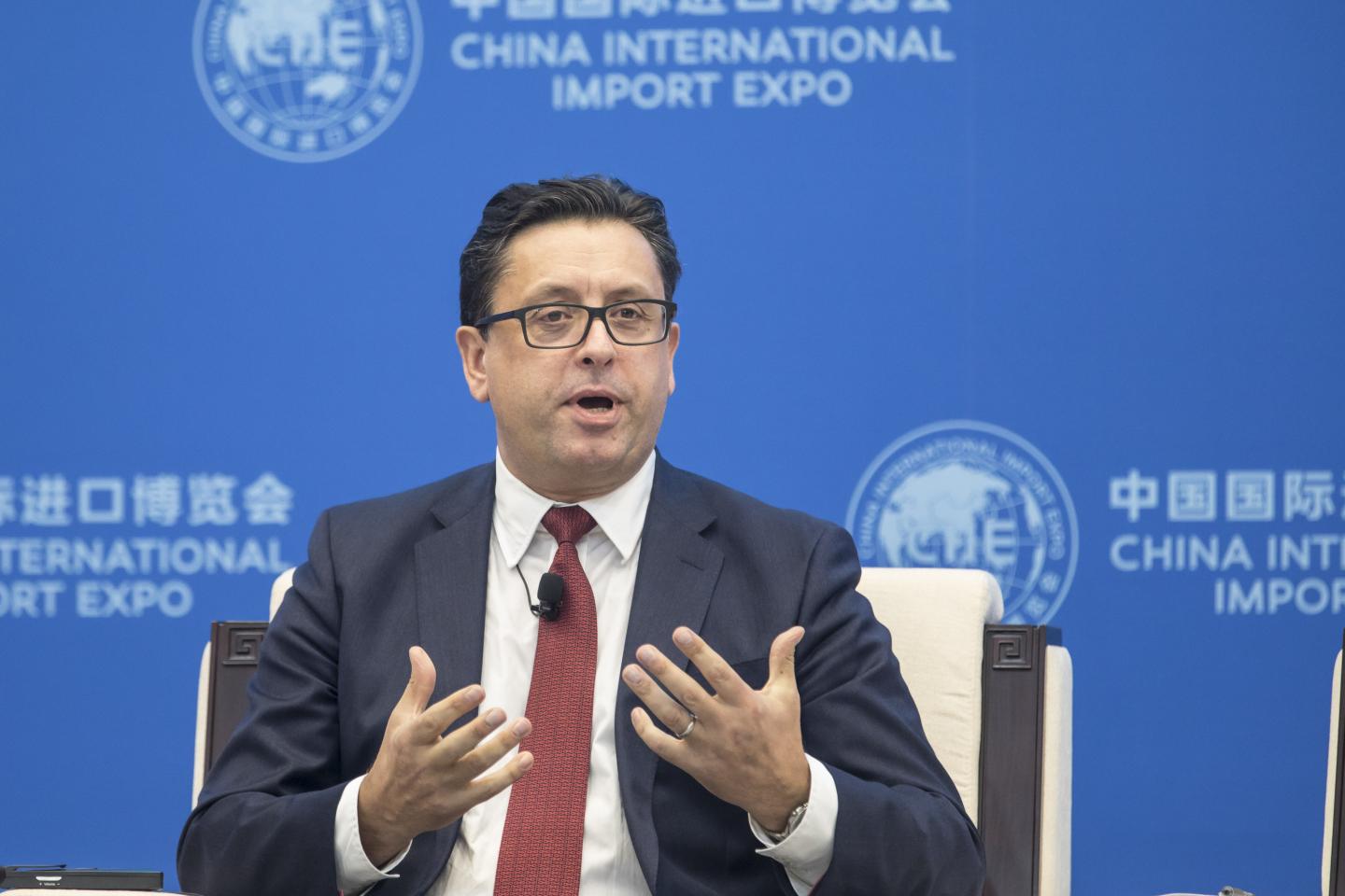 Paul Hudson, chief executive officer of Sanofi, gestures as he speaks during a panel session on the sidelines of the China International Import Expo (CIIE) in Shanghai, China, on Tuesday, Nov. 5, 2019. The CIIE -- now in its second year -- is designed to showcase the countrys desire to shift its economy toward consumption by buying more foreign goods. Photographer: Qilai Shen/Bloomberg via Getty Images