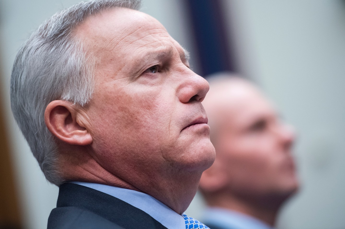 UNITED STATES - OCTOBER 30: John Hamilton, left, chief engineer of Boeings Commercial Airplanes division, and Dennis Muilenburg, CEO of Boeing, testify during the House Transportation and Infrastructure Committee hearing examining the design, development, and marketing, of the Boeing 737 Max jet in Rayburn Building on Wednesday, October 30, 2019. (Photo By Tom Williams/CQ-Roll Call, Inc via Getty Images)