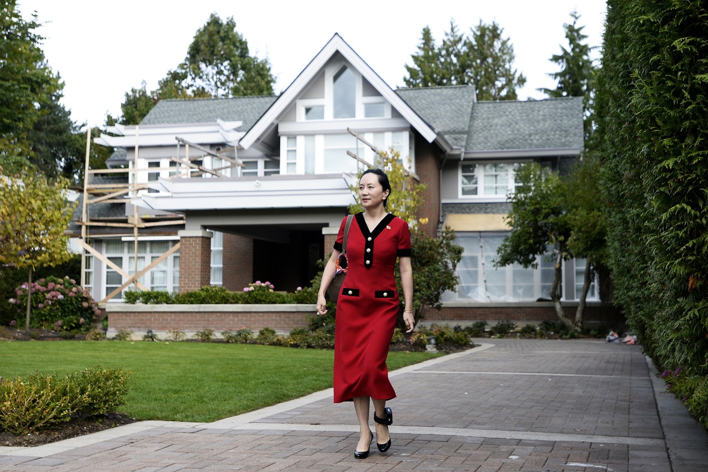 Bloomberg Best of the Year 2019: Meng Wanzhou, chief financial officer of Huawei Technologies Co., leaves her home for a court appearance wearing an electronic ankle tag in Vancouver, British Columbia, Canada, on Tuesday, Oct. 1, 2019. Photographer: Jennifer Gauthier/Bloomberg via Getty Images