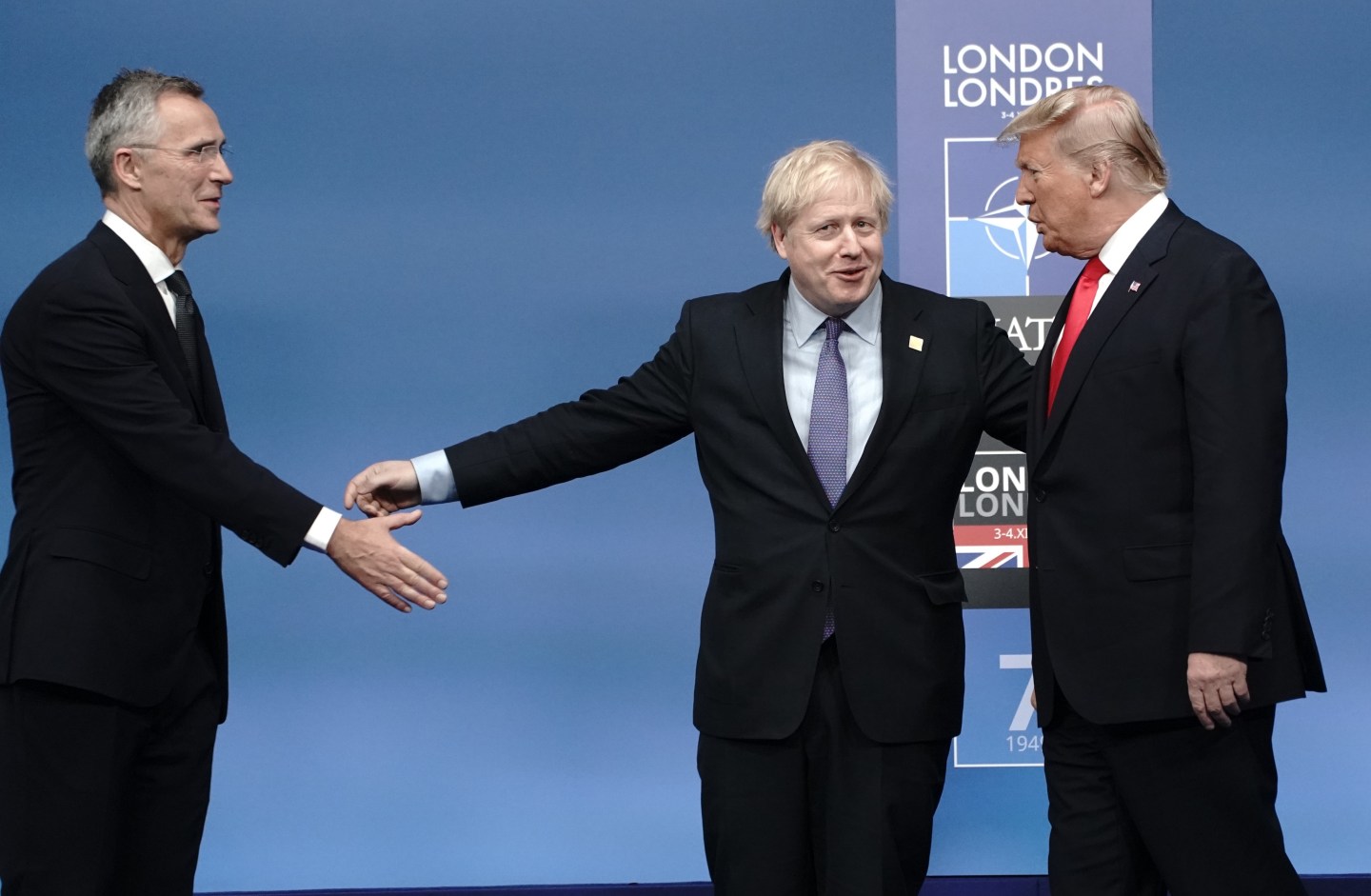 Jens Stoltenberg, Nato Secretary General, and Boris Johnson, Prime Minister of the United Kingdom, welcome US President Donald Trump to the Nato Summit before the start of the working session. The meeting of heads of state and government will celebrate the 70th anniversary of the military alliance.