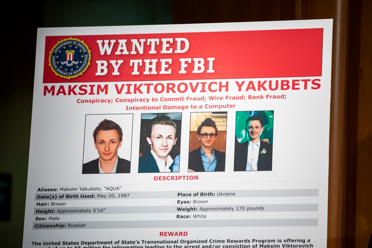 The wanted poster of Maksim Viktorovich Yakubets, also known as AQUA, who is one of two alleged Russian hackers that U.S. and U.K.