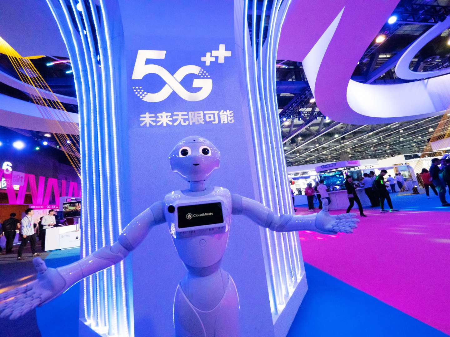 GUANGZHOU, CHINA - NOVEMBER 14: A CloudMinds robot welcomes guests during China Mobile Global Partners Conference 2019 at Poly World Trade Center Expo on November 14, 2019 in Guangzhou, Guangdong Province of China. (Photo by Li Zhihao/VCG via Getty Images)