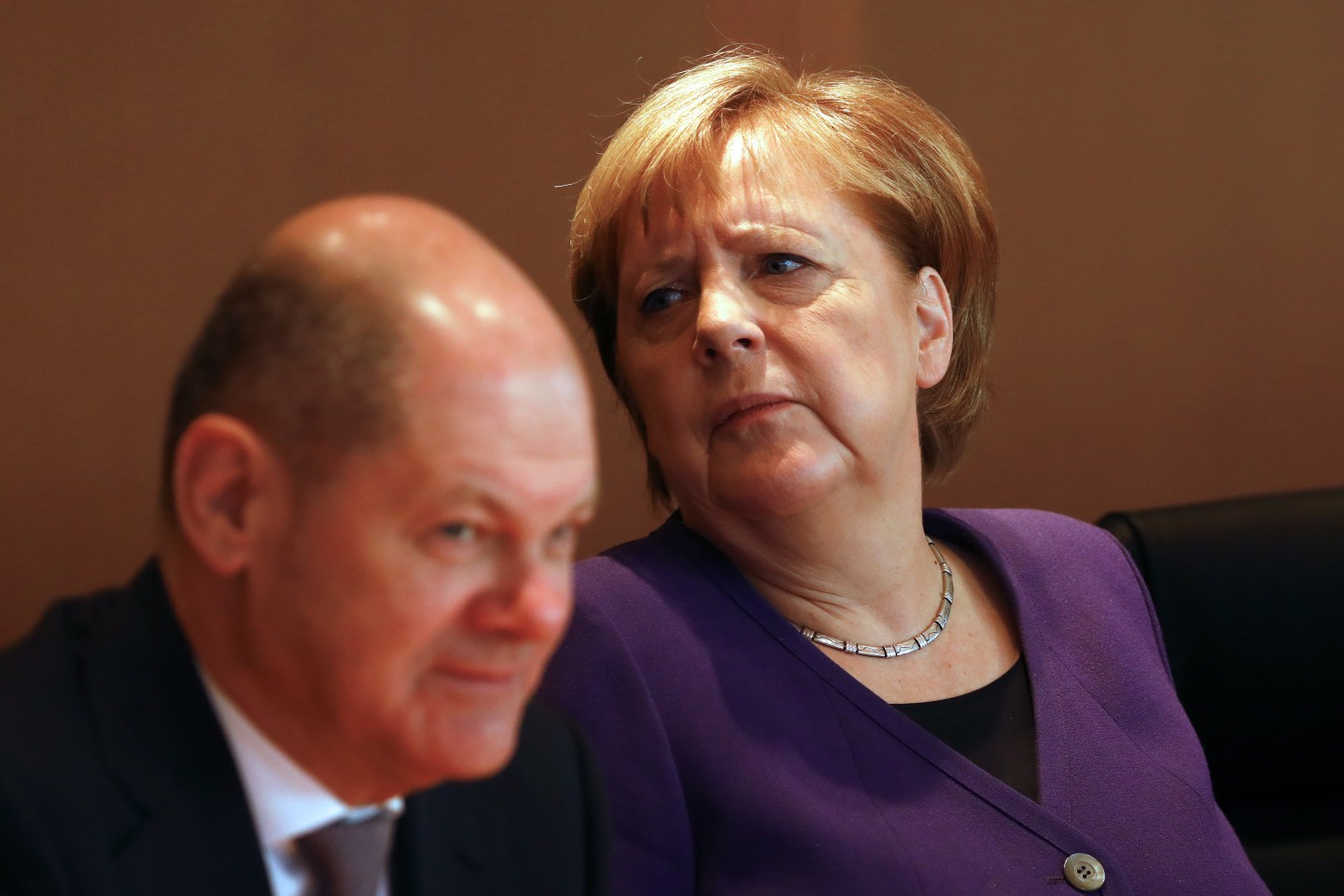 German Chancellor Angela Merkel (CDU) and Finance Minister and vice Chancellor, Olaf Scholz (SPD), arrive for the weekly cabinet meeting in the German chancellery on December 11, 2019 in Berlin, Germany.