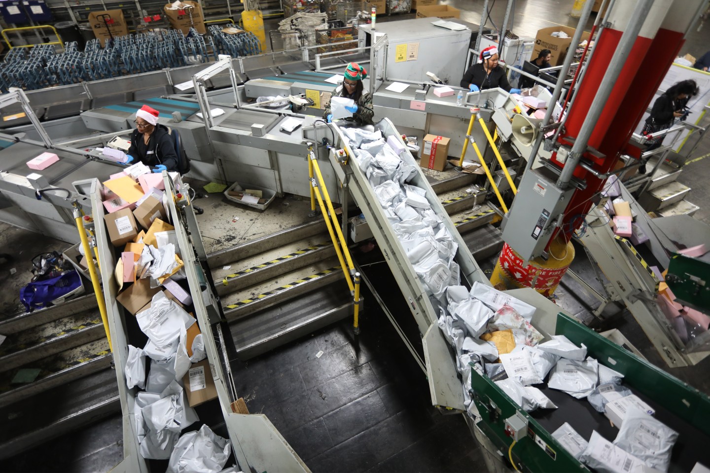U.S. Postal Service Processes Packages At Los Angeles Distribution Center During Holiday Season