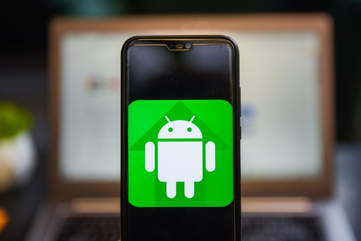 An Android logo seen displayed on a smartphone.