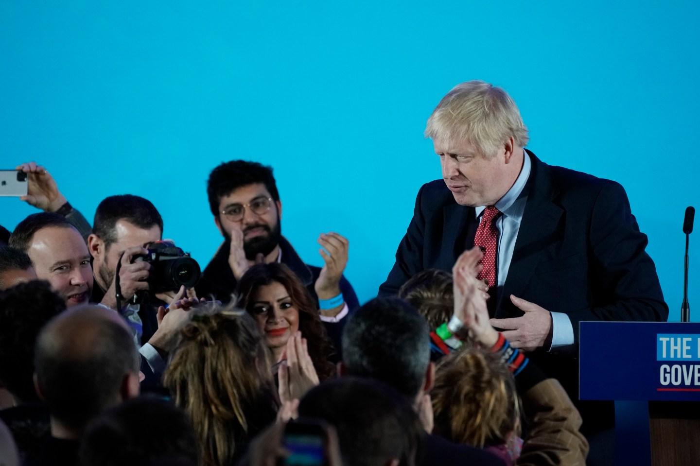LONDON, ENGLAND - DECEMBER 13: British Prime Minister and leader of the Conservative Party Boris Johnson leaves after speaking to supporters and press as the Conservatives celebrate a sweeping election victory on December 13, 2019 in London, England. Prime Minister Boris Johnson called the first UK winter election for nearly a century in an attempt to gain a working majority to break the parliamentary deadlock over Brexit. As the results roll in the Conservative Party has gained the number of seats needed to win a clear majority at the expense of the Labour Party. Votes are still being counted and an overall result is expected later today. (Photo by Christopher Furlong/Getty Images)