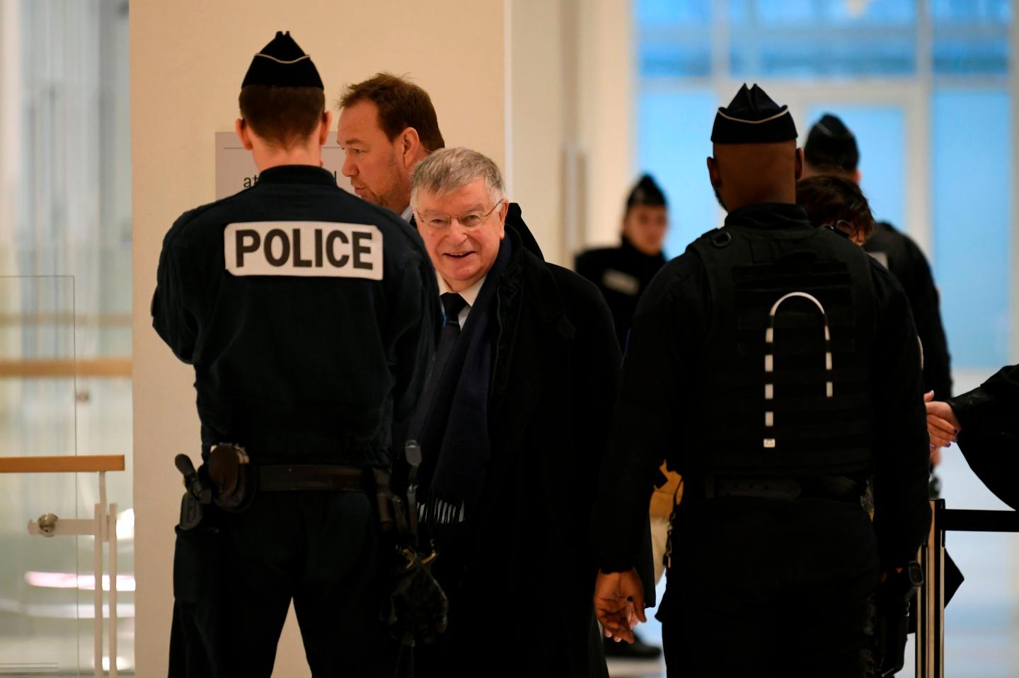 Former France Telecom CEO Didier Lombard (C) arrives at Paris Courthouse on December 20, 2019 for the ruling in France Telecom trial over series of suicides. - Paris' court gives its judgment on December 20, 2019 in the trial of several former members of France Telecom's management for "moral harassment". (Photo by Lionel BONAVENTURE / AFP) (Photo by LIONEL BONAVENTURE/AFP via Getty Images)