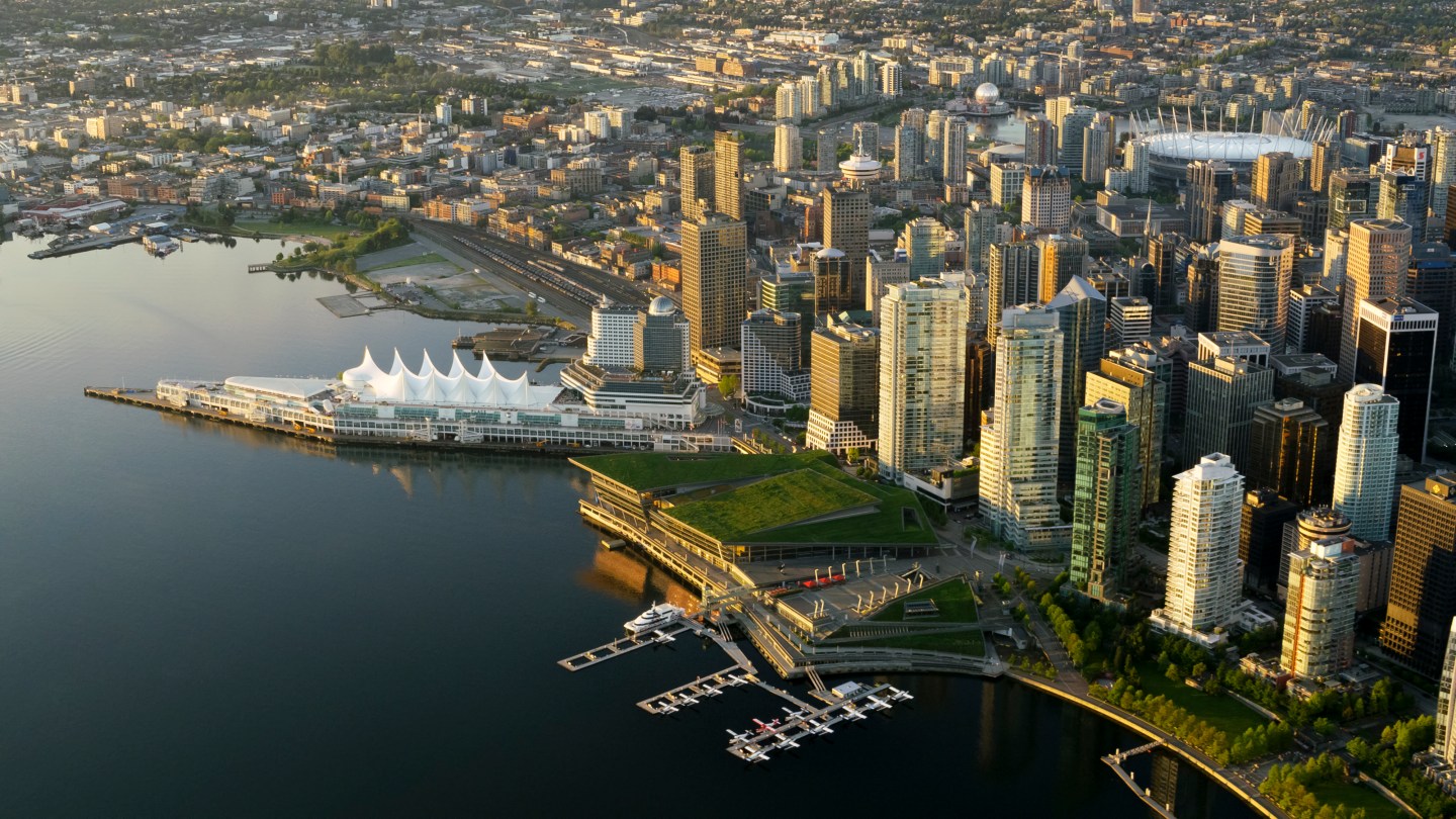 Aerial photo of Vancouver cityscape with Canada Place in the center.