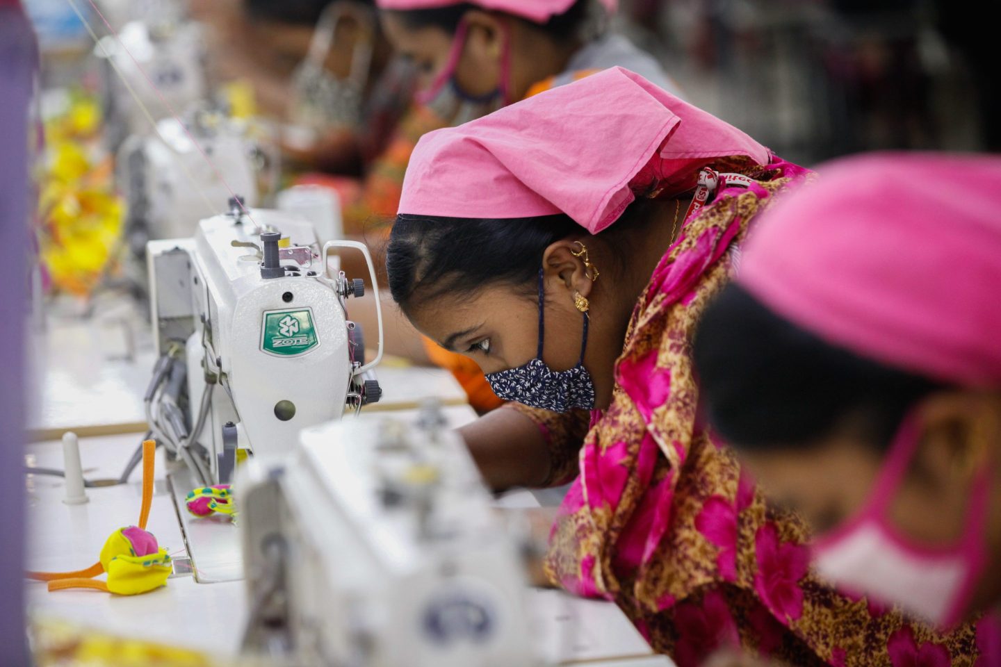 Bangladeshi female workers work at a garments factory in Gazipur outskirts of Dhaka on February 17, 2018.
The garment sector has provided employment opportunities to women from the rural areas that previously did not have any opportunity to be part of the formal workforce. This has given women the chance to be financially independent and have a voice in the family because now they contribute financially.However, women workers face problems. Most women come from low income families. Low wage of women workers and their compliance have enabled the industry to compete with the world market.The textile and clothing industries provide the single source of growth in Bangladesh's rapidly developing economy. Exports of textiles and garments are the principal source of foreign exchange earnings. Bangladesh is the world's second-largest apparel exporter of western (fast) fashion brands. Sixty percent of the export contracts of western brands are with European buyers and about forty percent with American buyers. (Photo by Mehedi Hasan/NurPhoto via Getty Images)