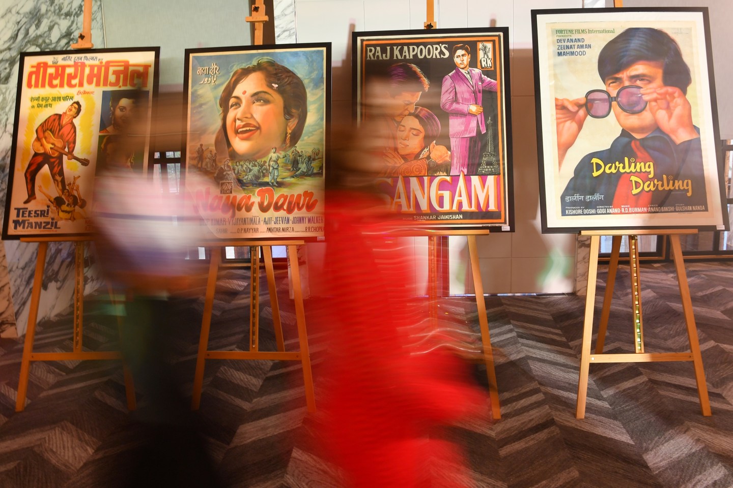 Walking past Bollywood posters