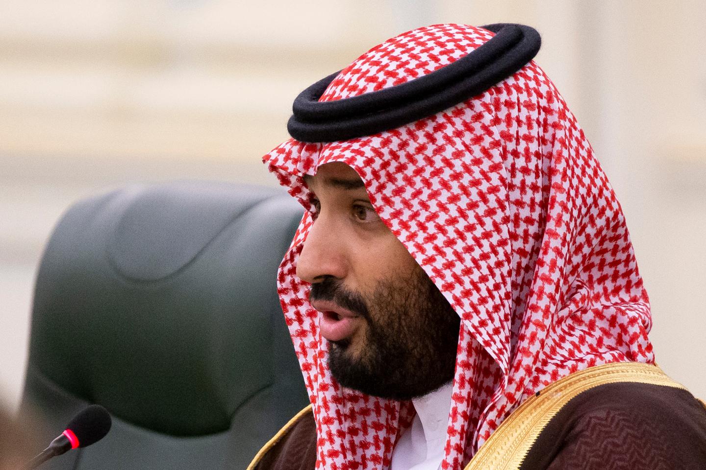 FILE - In this Oct. 14, 2019 file photo, Saudi Arabia's Crown Prince Mohammed bin Salman speaks to Russian President Vladimir Putin during the talks in Riyadh, Saudi Arabia. United Nations experts Wednesday, Jan. 22, 2020 called for an "immediate investigation" by the United States and others into information they received that suggests that Jeff Bezos' phone was hacked after receiving a file sent from Saudi Crown Prince Mohammed bin Salman's WhatsApp account. (AP Photo/Alexander Zemlianichenko, Pool)
