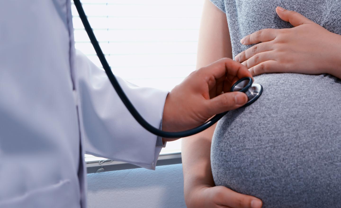 Doctor Examining Pregnant Woman
