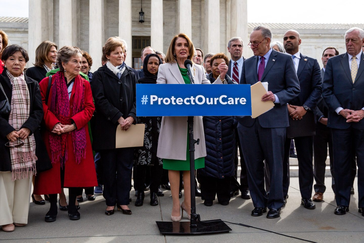 U.S. House Speaker Nancy Pelosi, a Democrat from California, center, speaks during an event with House and Senate Democrats on protecting the Affordable Care Act outside the Supreme Court Building in Washington, D.C., U.S., on Tuesday, April 2, 2019. U.S. President Donald Trump's tweet about waiting until after the 2020 election to vote on healthcare overhaul shows that Republicans "have no plan," Senate Majority Leader Chuck Schumer told reporters. Photographer: Anna Moneymaker/Bloomberg via Getty Images