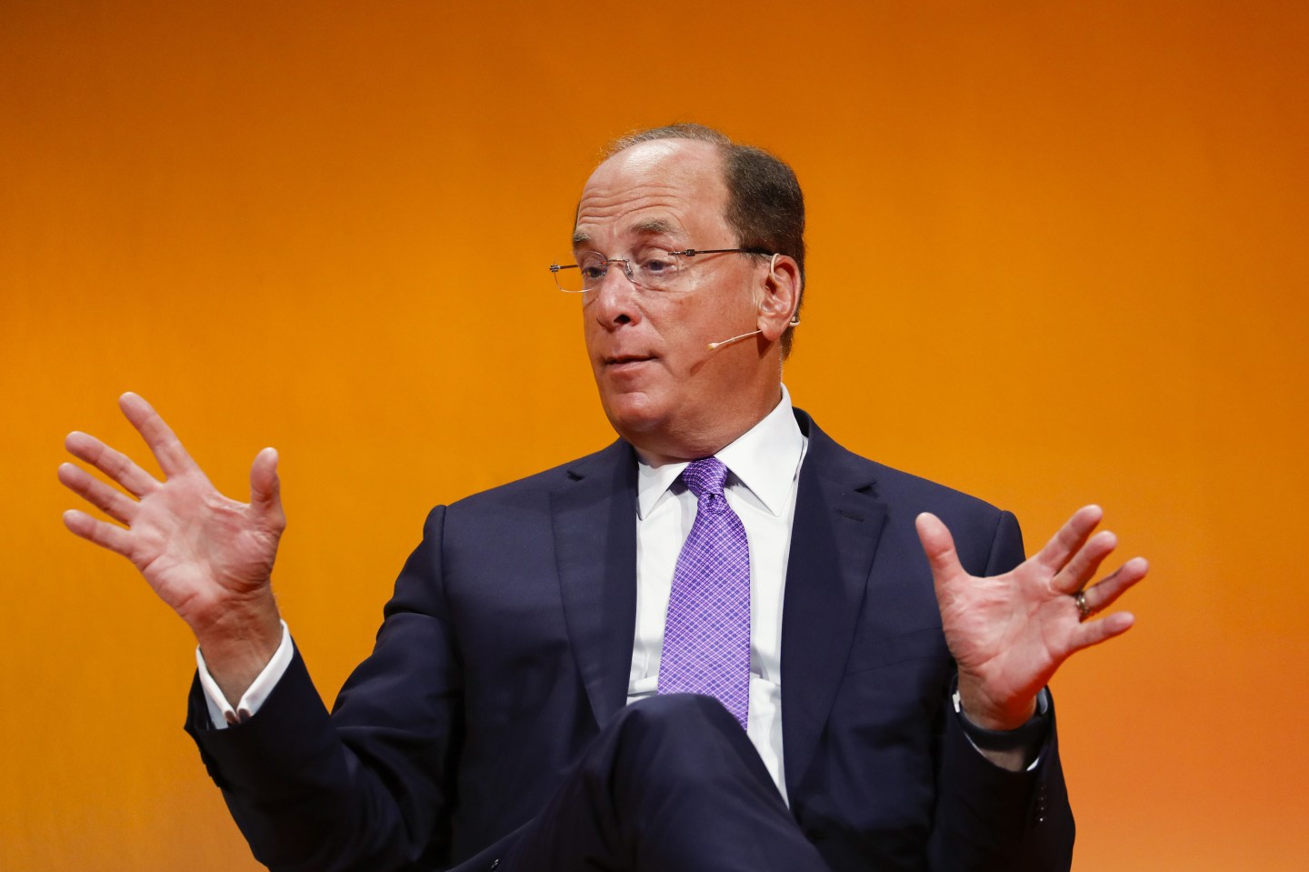 Larry Fink, chief executive officer of BlackRock Inc., gestures while speaking at the Handelsblatt Banking Summit in Frankfurt, Germany, on Wednesday, Sept. 4, 2019. Deutsche Bank AG Chief Executive Officer Christian Sewing said that the banks most radical revamp in years is set to deliver higher returns for investors, even as it grapples with the prospect of lower interest rates and a slumping German economy. Photographer: Alex Kraus/Bloomberg via Getty Images