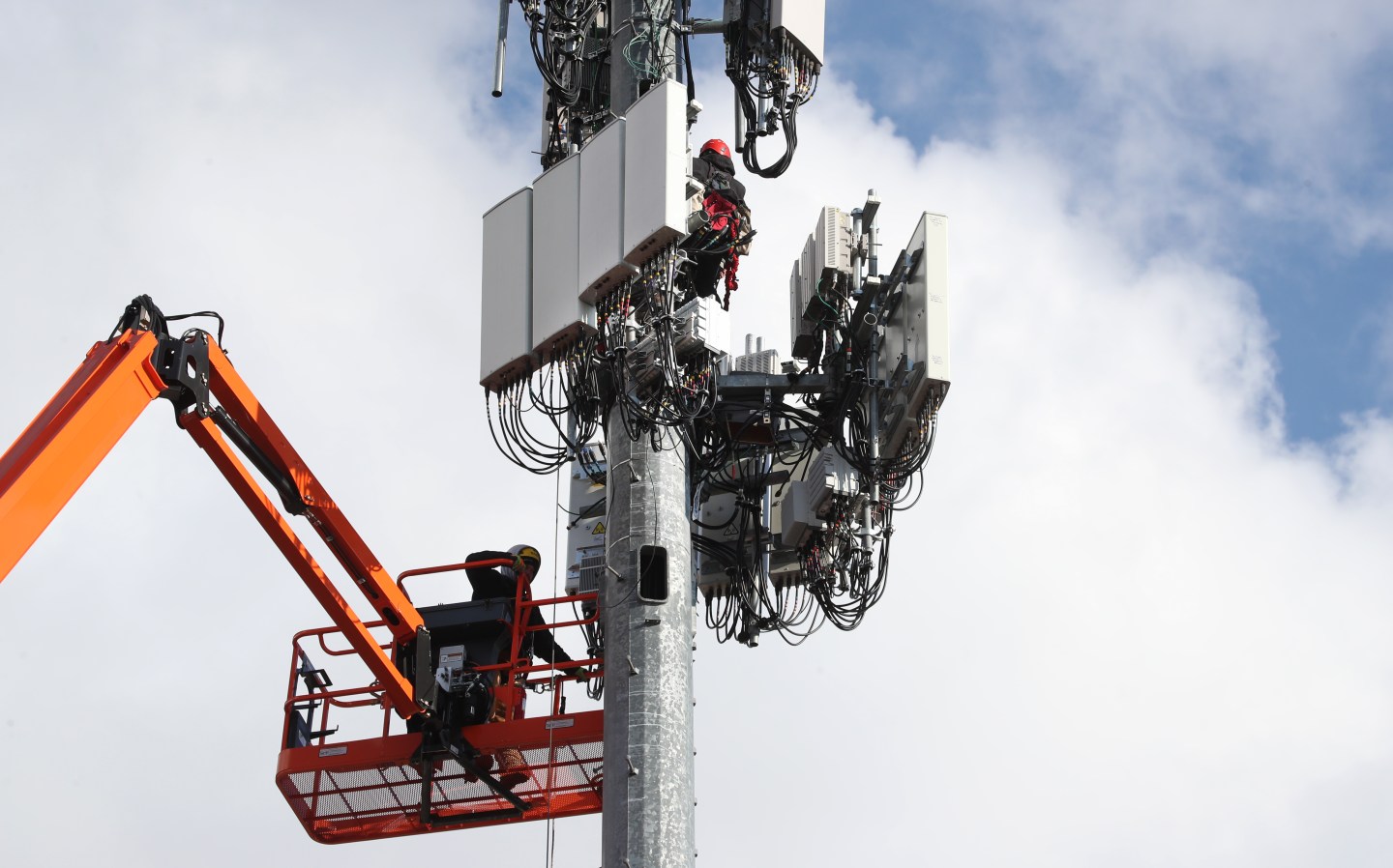 OREM, UT - NOVEMBER 26: Workers rebuild a cellular tower with 5G equipment for the Verizon network on November 26, 2019 in Orem, Utah. The new 5G networks that are coming soon, will be 10x faster than the old 4G networks. (Photo by George Frey/Getty Images)