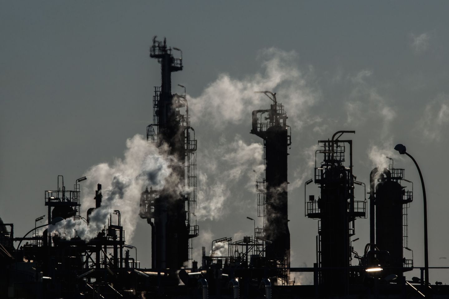 A picture taken on December 2, 2019 in Donges, near Saint-Nazaire, western France, shows a view of Total Refinery and fuel depot as public works companies (BTP) workers strain some accesses to protest against a planned tax reform. (Photo by LOIC VENANCE / AFP) (Photo by LOIC VENANCE/AFP via Getty Images)