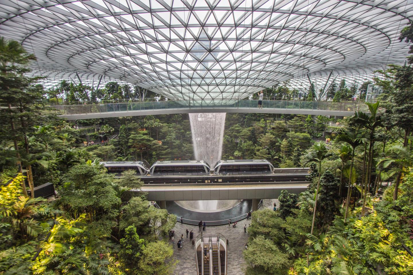 The skytrain rides past the Rain Vortex at the Jewel Changi Airport, Singapore