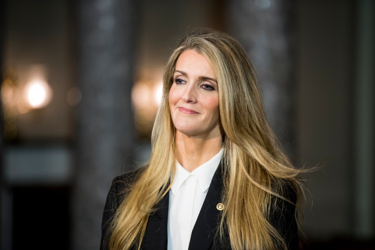 Sen. Kelly Loeffler waiting for her swear-in reenactment for the cameras in the Capitol on Monday, Jan. 6, 2020.